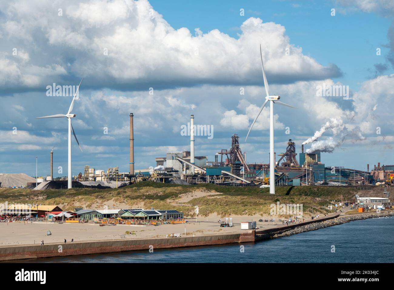 View at steel factory Tata steel and windmills in IJmuiden, Holland Stock Photo
