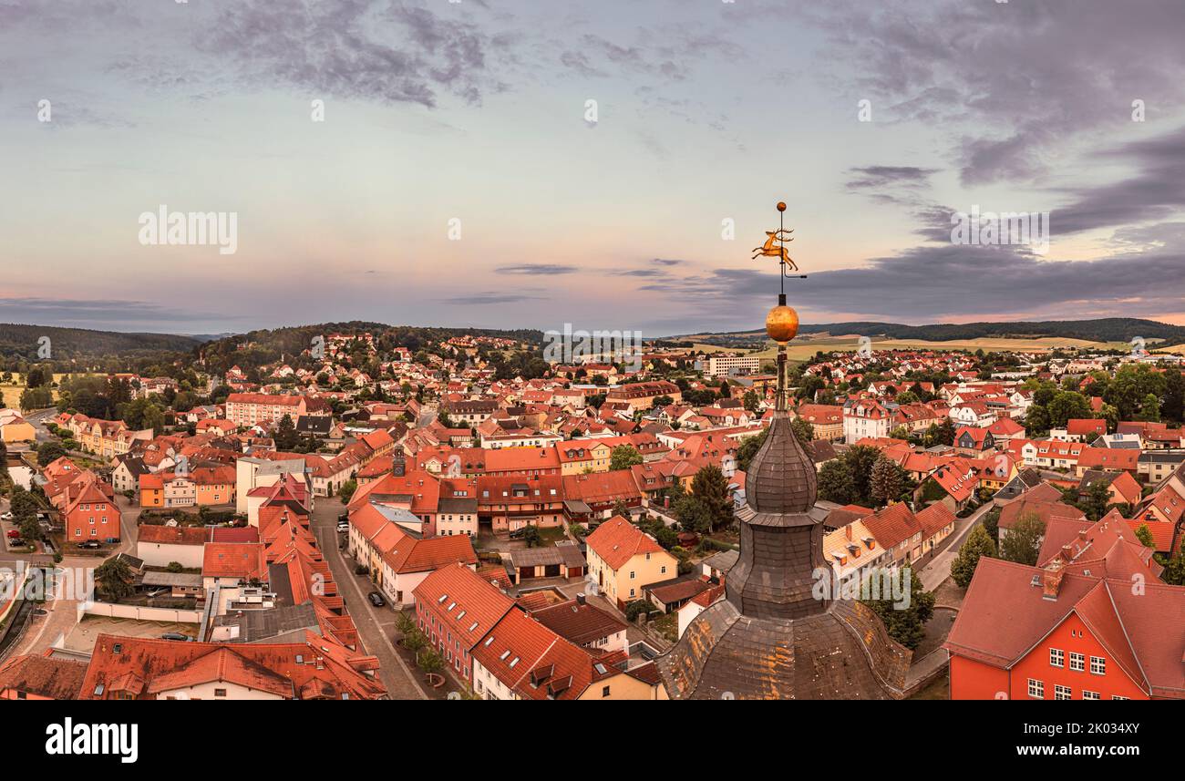 Germany, Thuringia, Bad Berka, church spire, church weather vane (jumping deer), city, overview, morning light Stock Photo