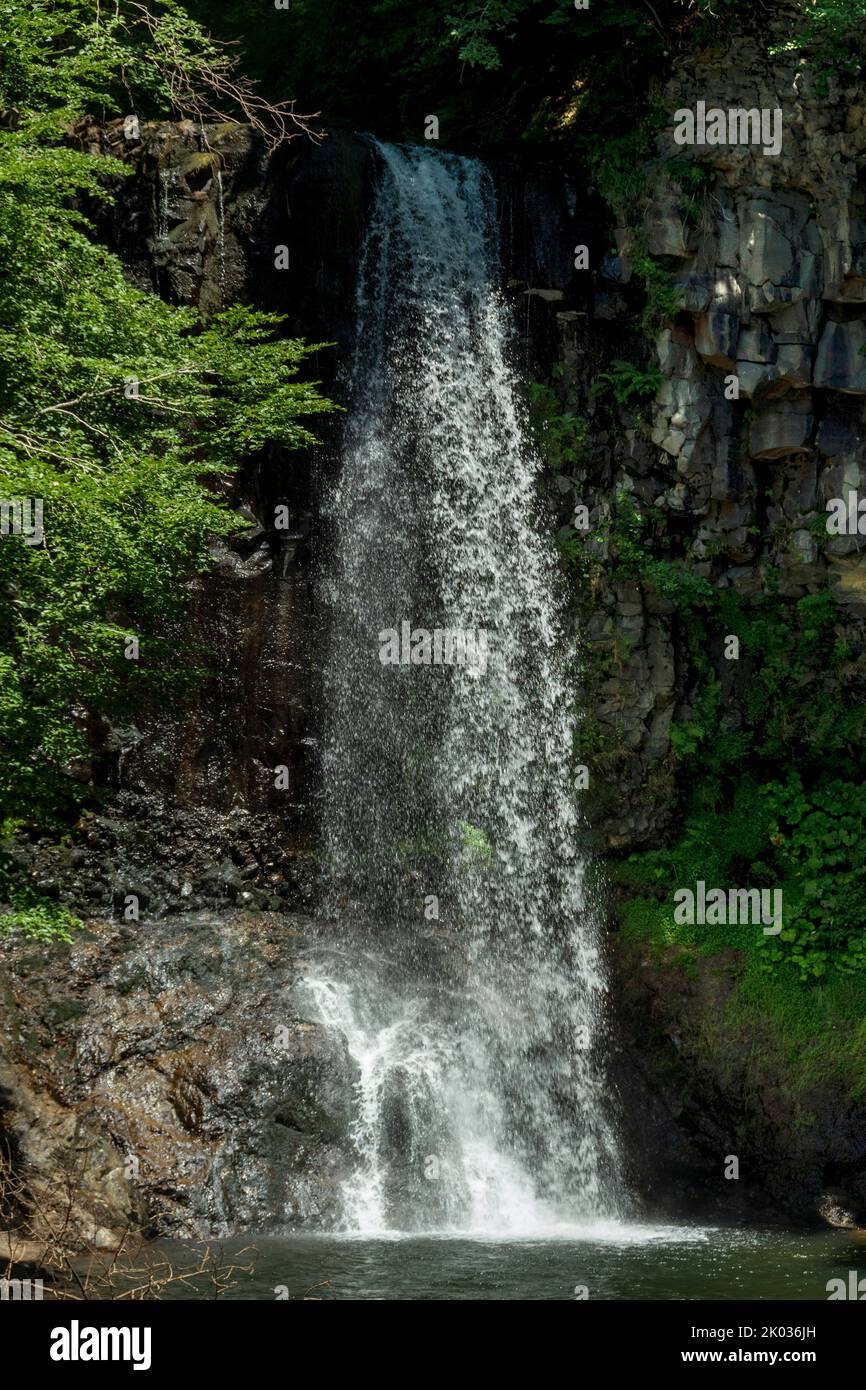 Waterfall of Egliseneuve d'Entraigues . Auvergne Volcanoes Regional Nature Park.Puy de Dome department. Auvergne. France Stock Photo
