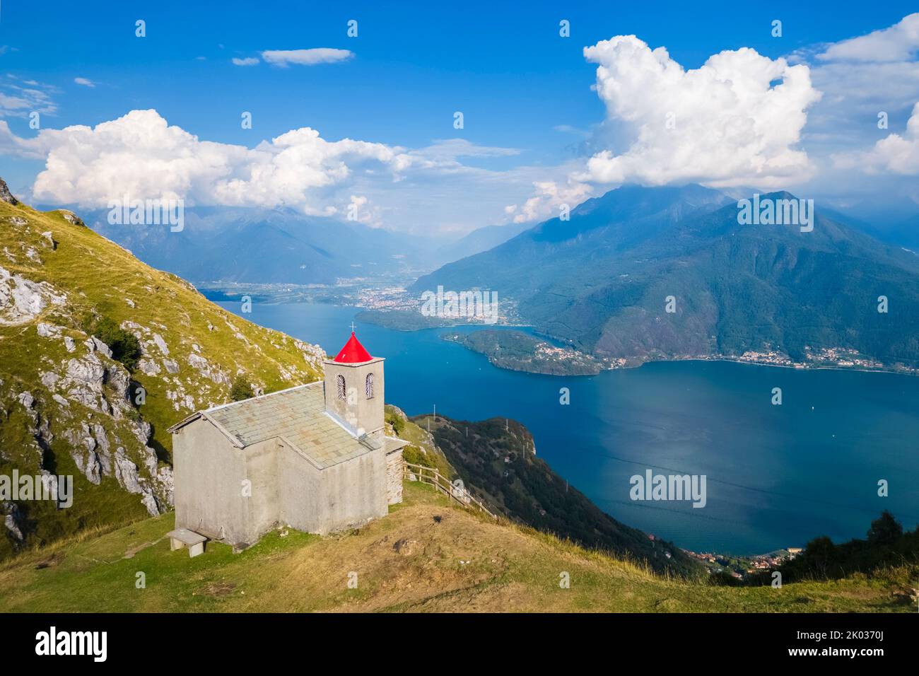 Aerial view of the church of San Bernardo on the mounts over Musso overlooking Lake Como. Musso, Como district, Lake Como, Lombardy, Italy. Stock Photo