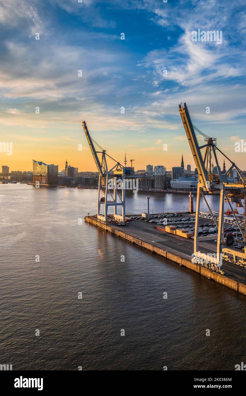 Container terminal in the port of Hamburg, Germany with Elbphilharmonie in the background Stock Photo