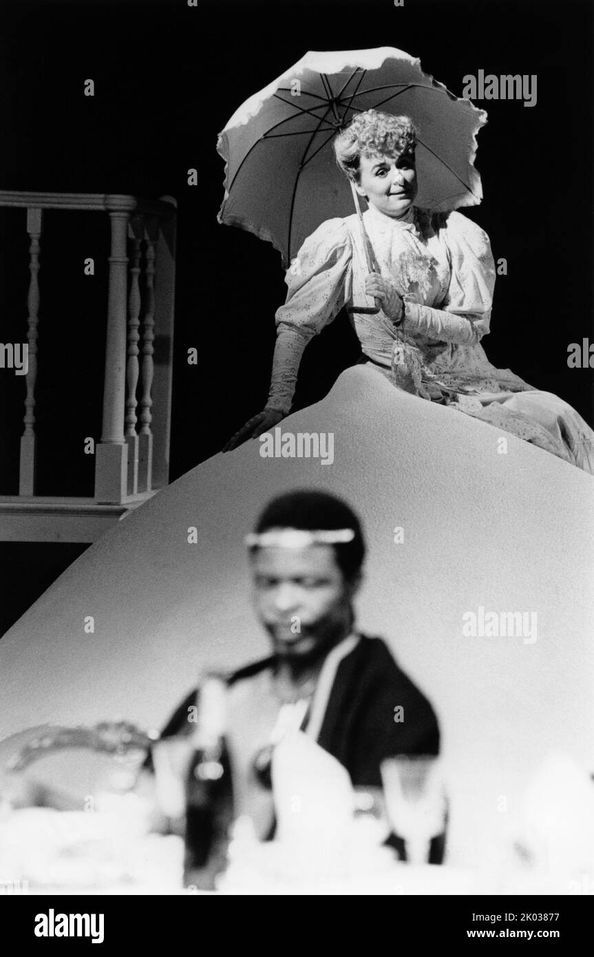 Sinead Cusack (Daisy Bone), Yemi Ajibade (Count Antonio de Rosario) in THE CUSTOM OF THE COUNTRY by Nicholas Wright at Royal Shakespeare Company (RSC), The Pit, Barbican Centre, London EC2  12/10/1983  design: Ralph Koltai  lighting: Michael Calf  director: David Jones Stock Photo