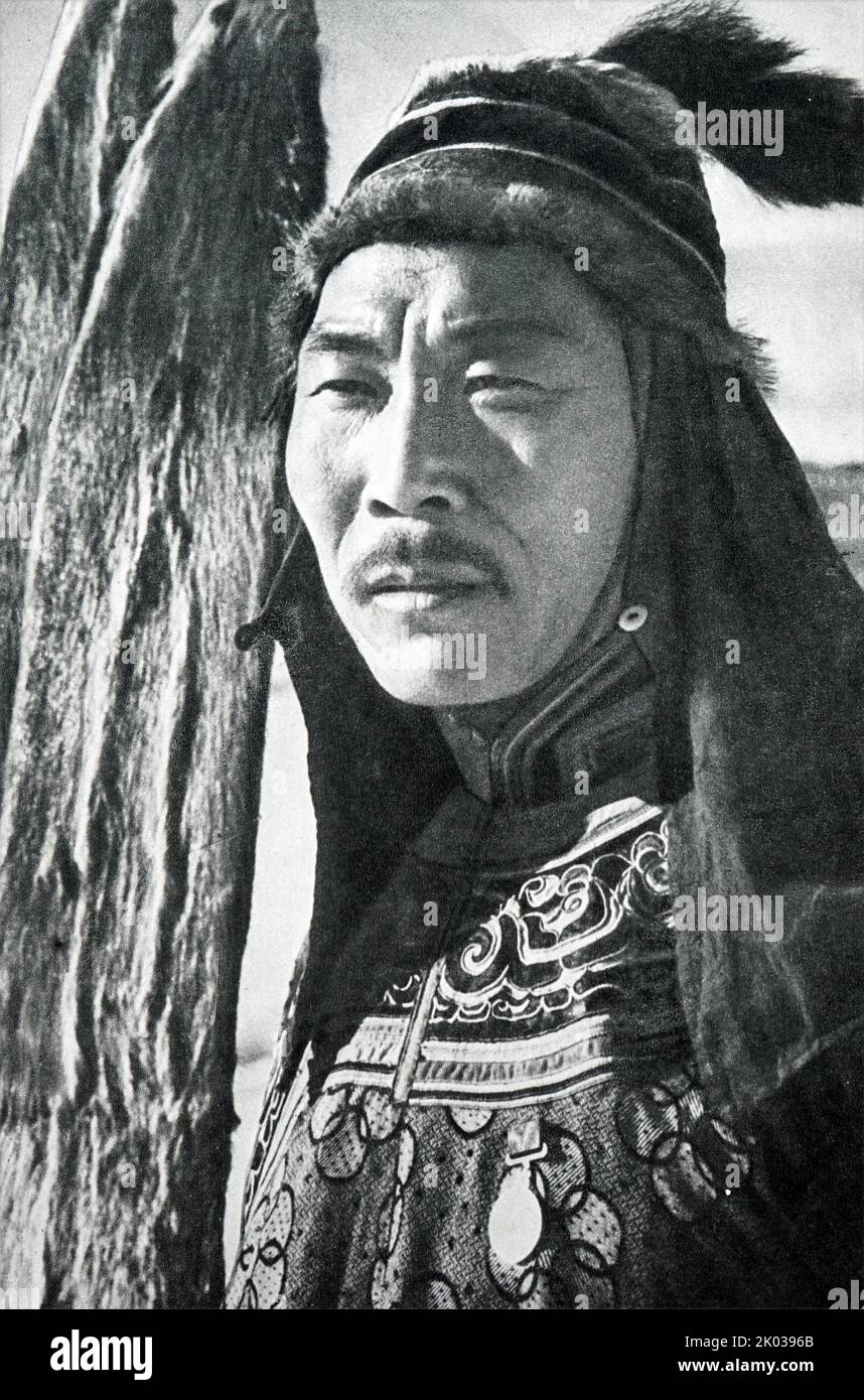 Siberian hunter in traditional central Asian clothes. USSR 1965 Stock Photo