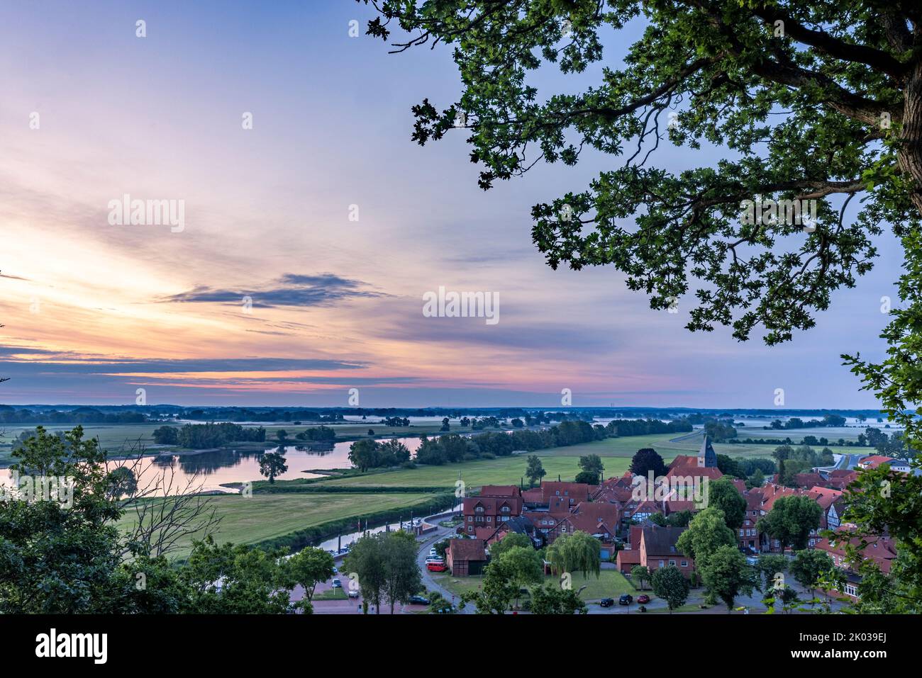 Early morning view from the vineyard in Hitzacker to the old town and the river Elbe Stock Photo