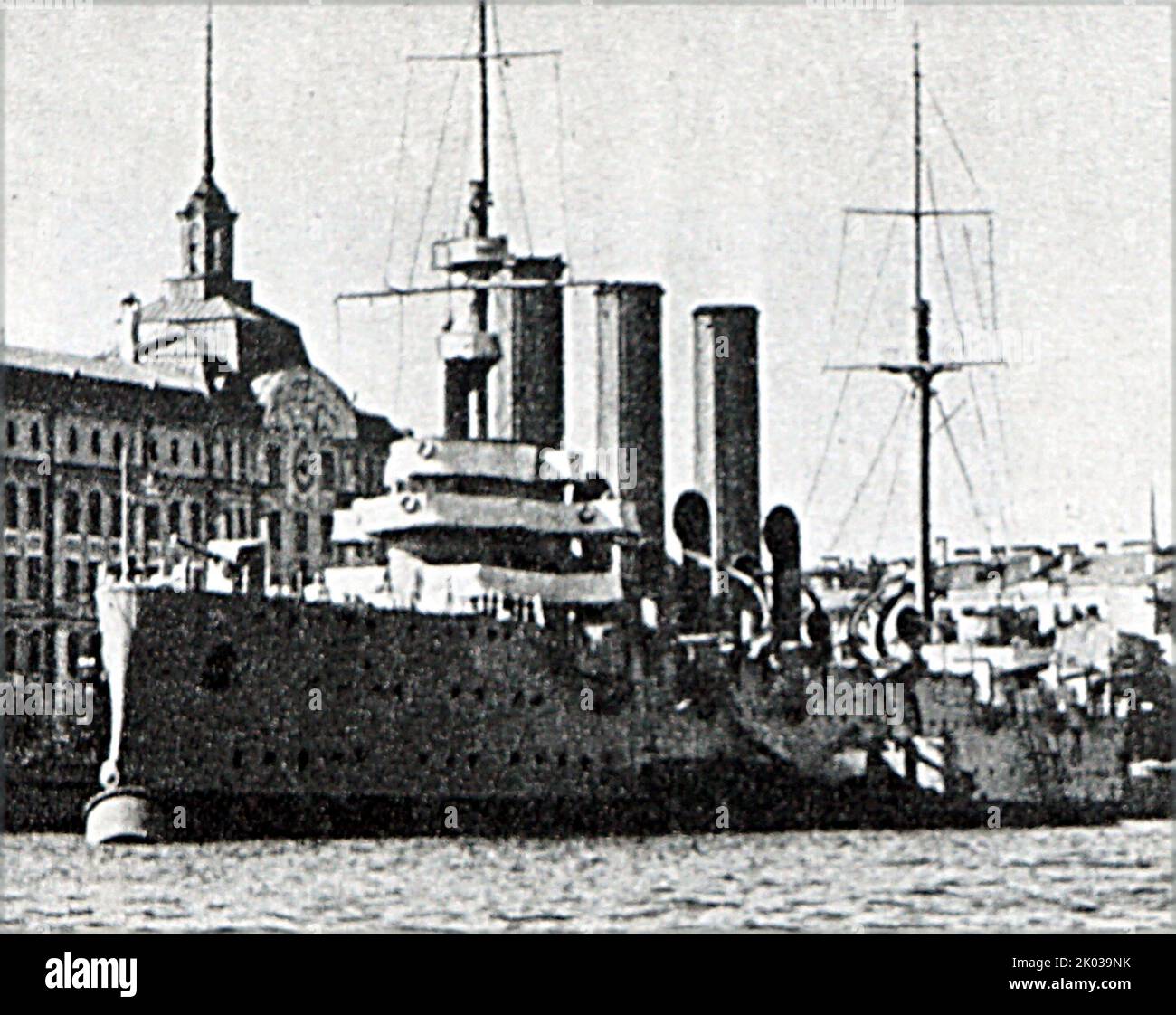 Russian battleship Aurora during the October Revolution of 1917. The crew joined the February Revolution of 1917. On October 25, 1917, at 9:40 pm, a blank shot from her guns was the signal for the start of the storming of the Winter Palace, which was to be the beginning of the October Revolution. Stock Photo