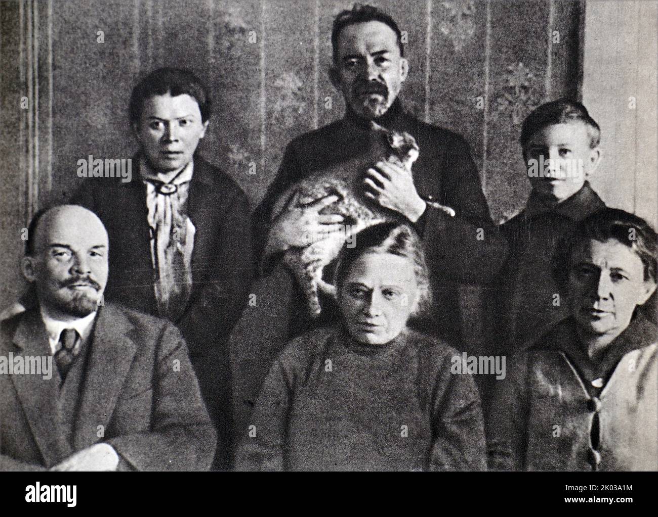 Vladimir Lenin, N. K. Krupskaya, A. I. Elizarova, M. I. Ulyanov, D. I. Ulyanov and G. Lozgachev in the Kremlin apartment of V. I. Lenin. Moscow, autumn 1920. Photo by D. Leshchenko. Stock Photo