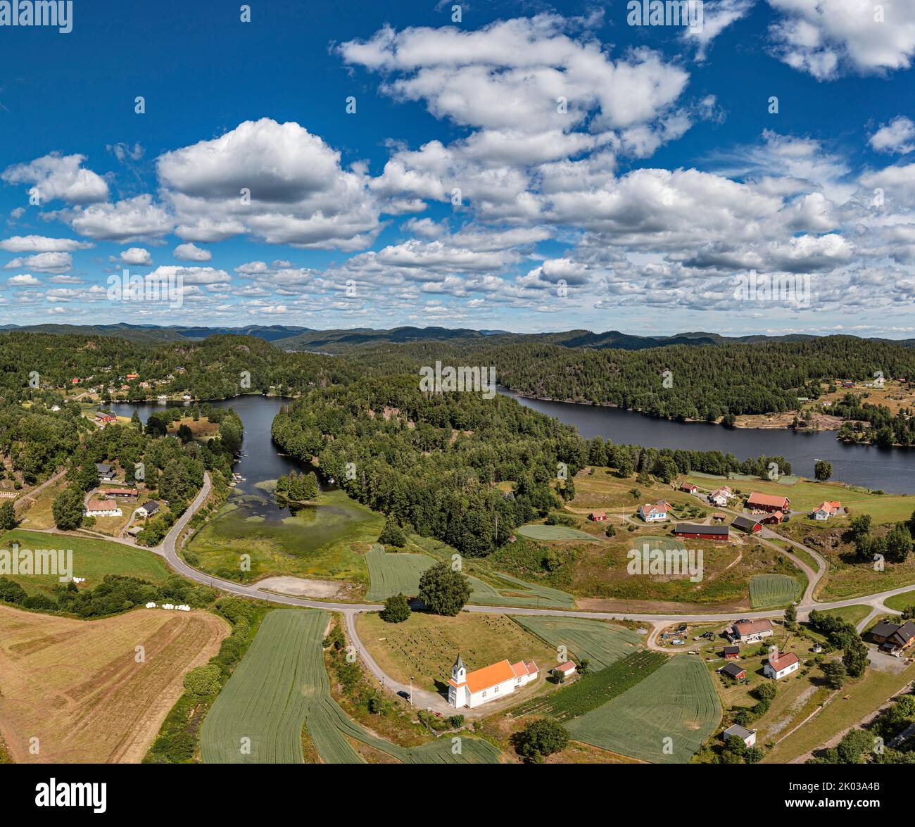 Norway, Vestfold og Telemark, Larvik, Kjose, isolated houses, church, road, farris, lake, forest, mountains, overview, aerial view Stock Photo