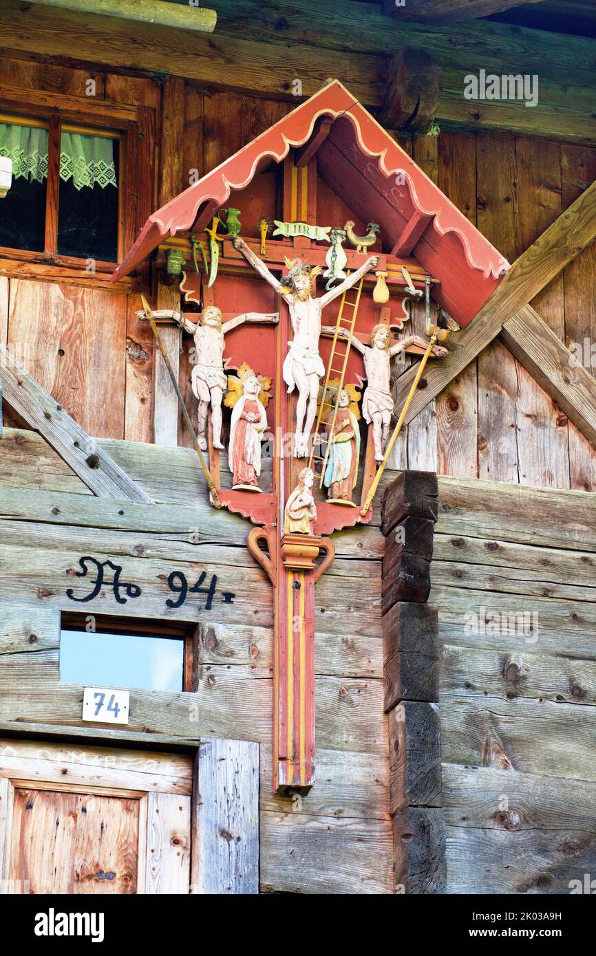 unique altarpiece of the Val Gardena from 1838 at a farmhouse in the Ulten Valley Stock Photo