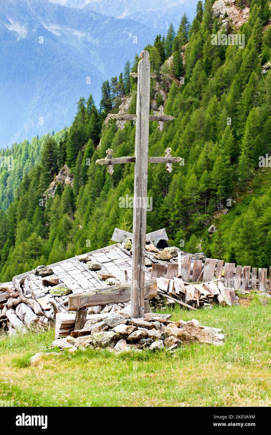 Weather cross on the Marschnellalm in the South Tyrolean Ulten Valley Stock Photo
