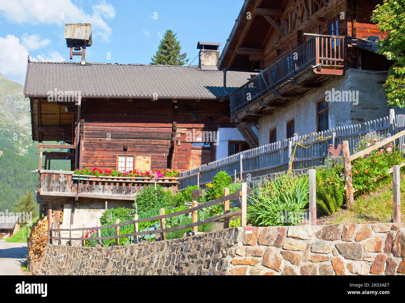 Mountain farmhouse with the rare bell tower in the South Tyrolean Ulten valley Stock Photo
