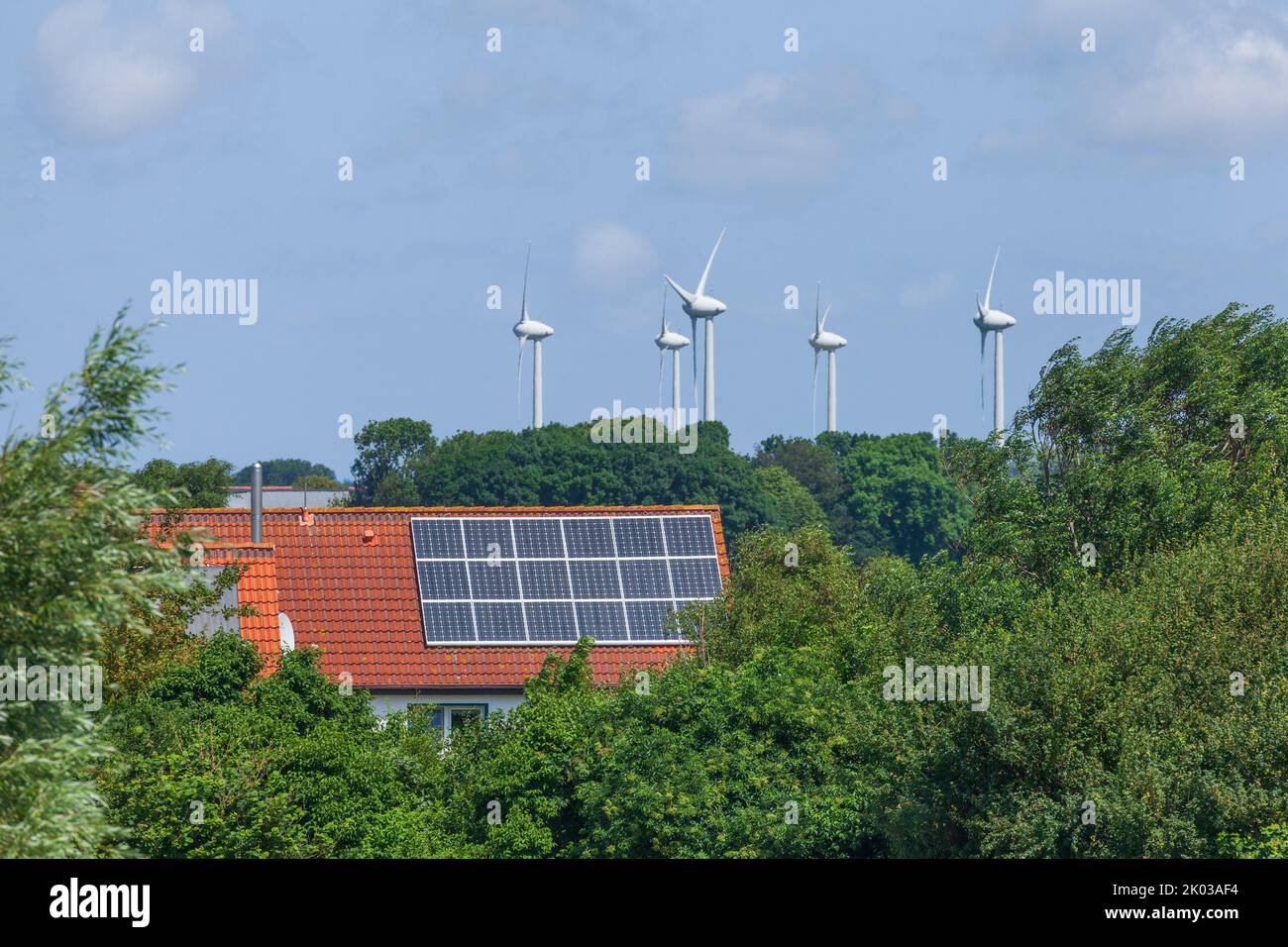Wind turbines, solar roof, Dorumer Neufeld, Dorum, Lower Saxony, Germany, Europe Stock Photo