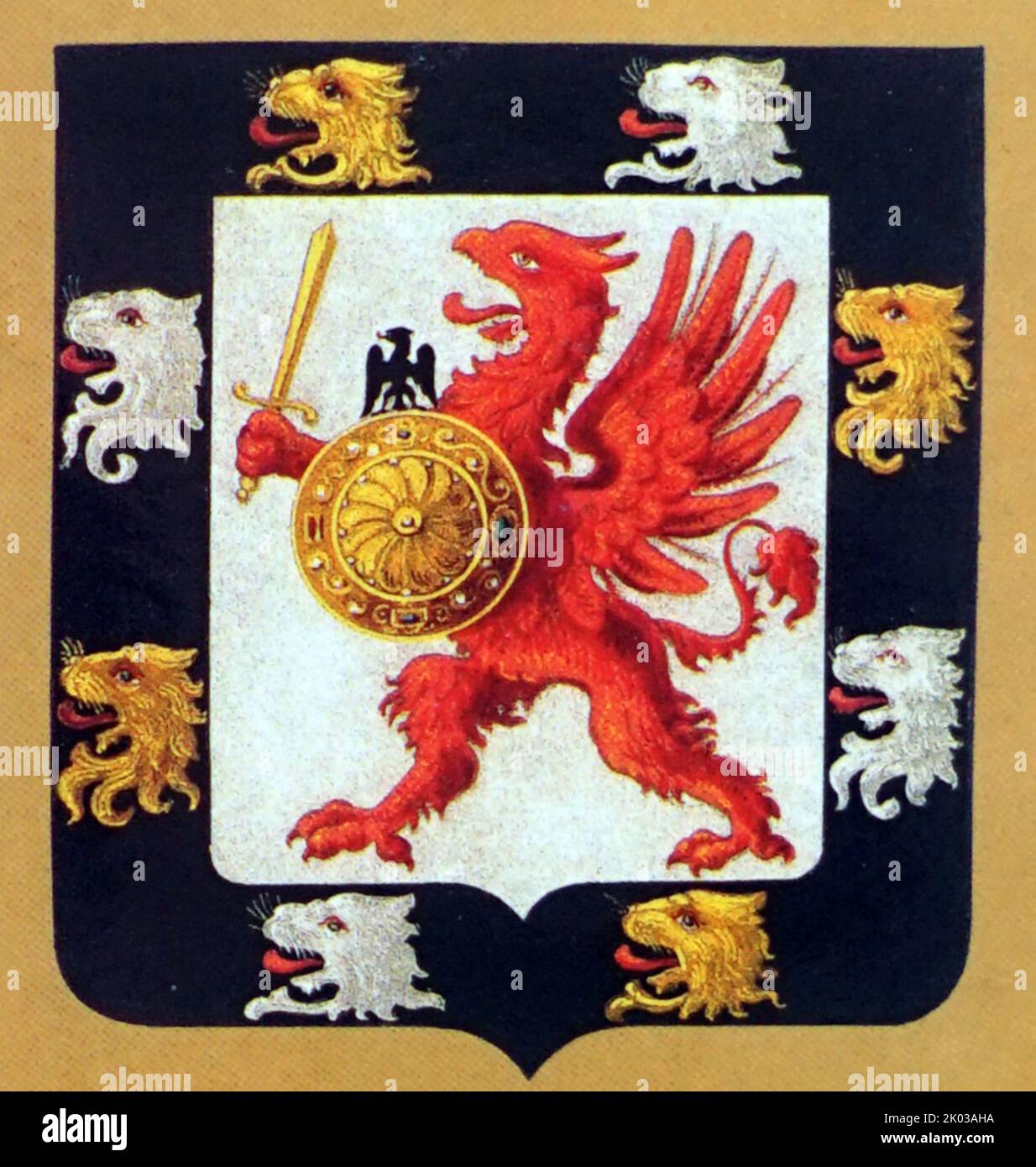 Coat of arms of the Romanov boyars. In a field of silver there is a scarlet vulture holding a golden sword and a torch crowned with a small eagle; on a black border, eight torn off lion heads, four gold and four silver. Stock Photo