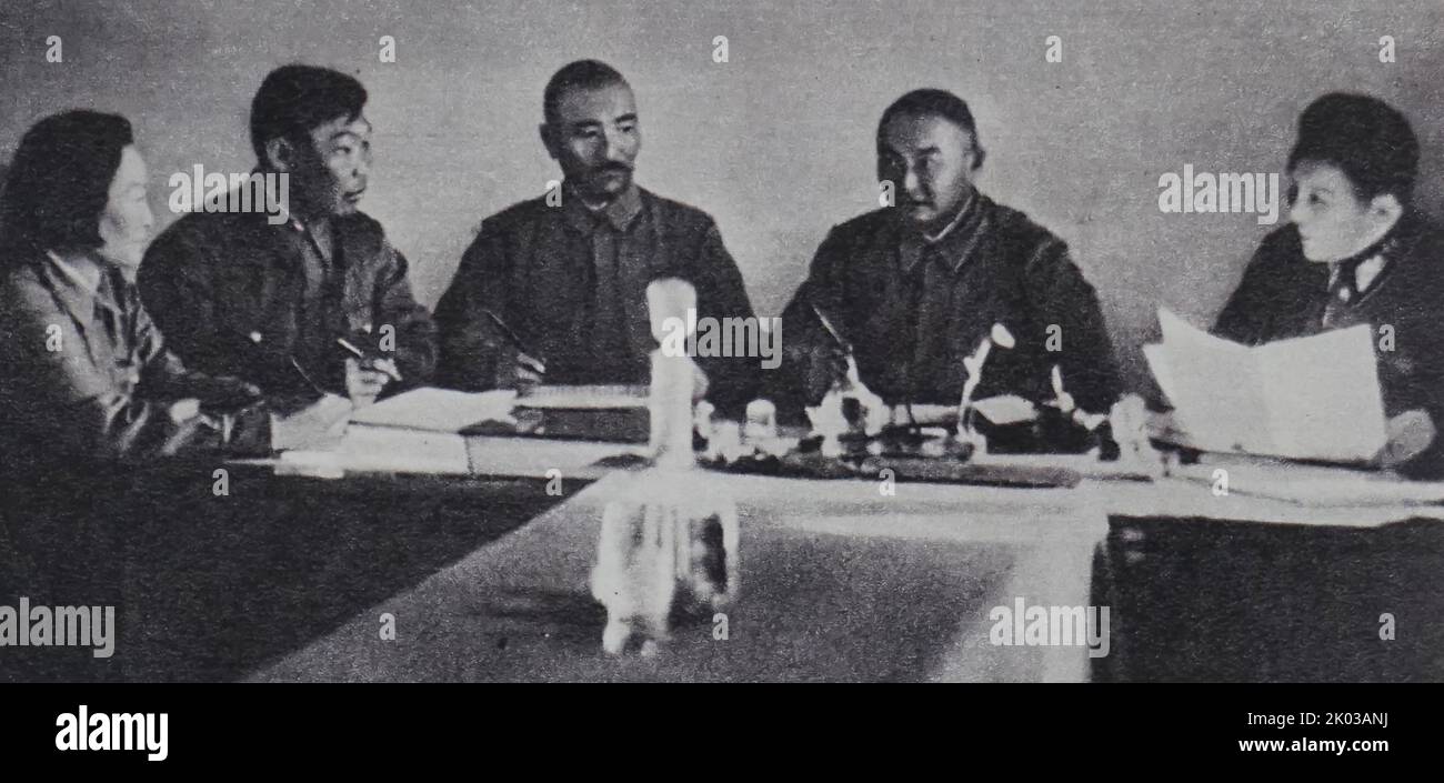 Presidium of the Central Committee of the Mongolian Republic. From right to left: Y. Tsedenbal, H. Choibalsan, Chairman of the Presidium, G. Bumtsend, secretary of the Central Committee, Ch. Surenzhav and S. Yanzhimaa (wife of Sukhe-Bator). Stock Photo