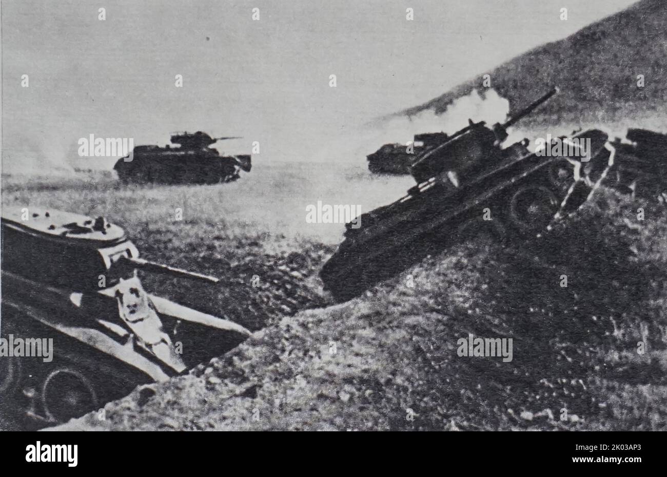 Soviet armoured unit advancing against German army. Russia, World War Two 1941. Stock Photo