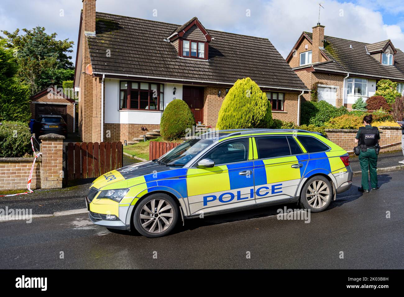 Saintfield, Northern Ireland, UK, 09/09/2022 - Police close off a property after a suspicious device was left on the front step.  It was later declared to be a hoax. Stock Photo