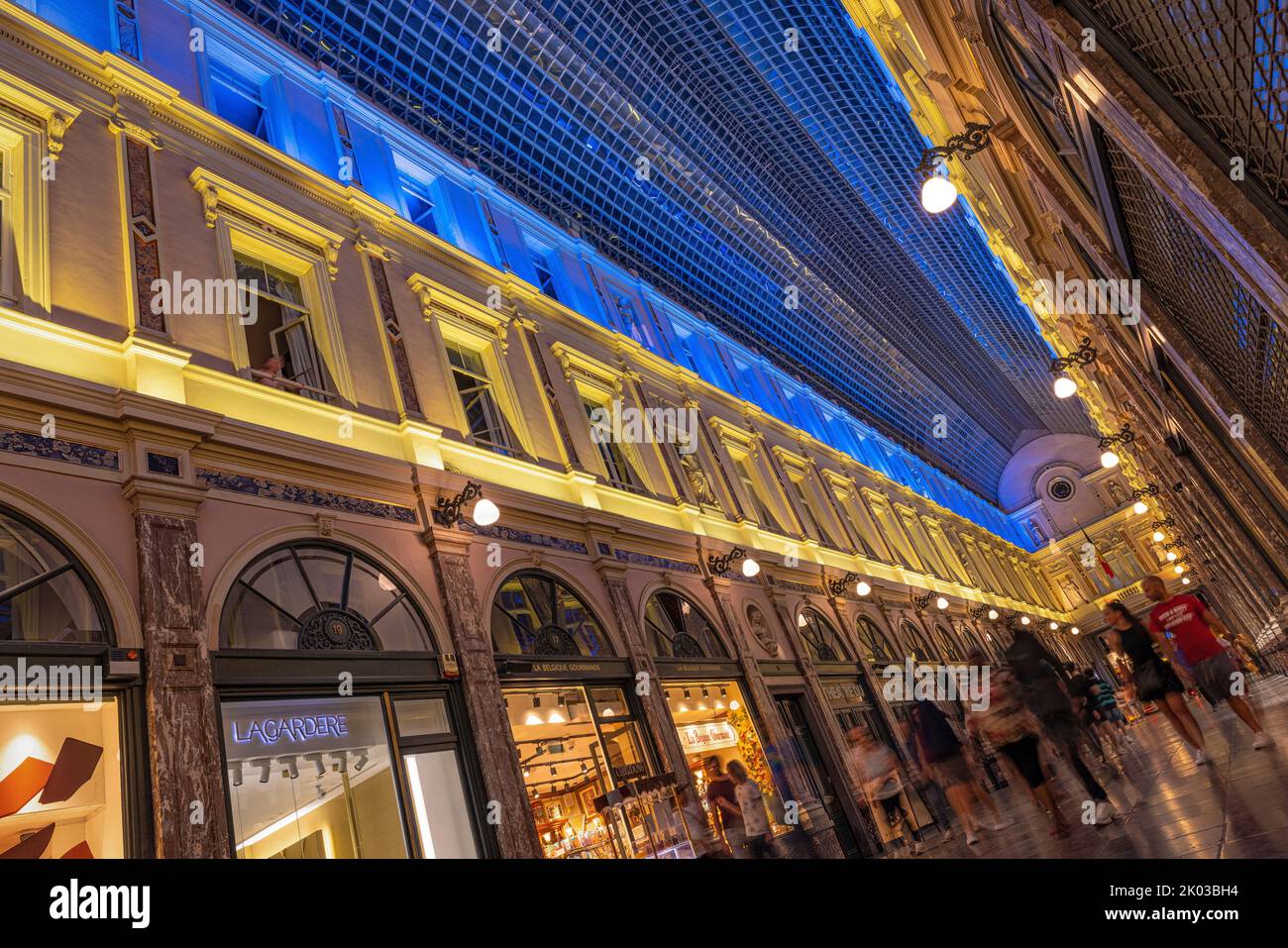Galleries de la Reine, illuminated in the colors of the Ukrainian flag. Brussels, Belgium. Stock Photo