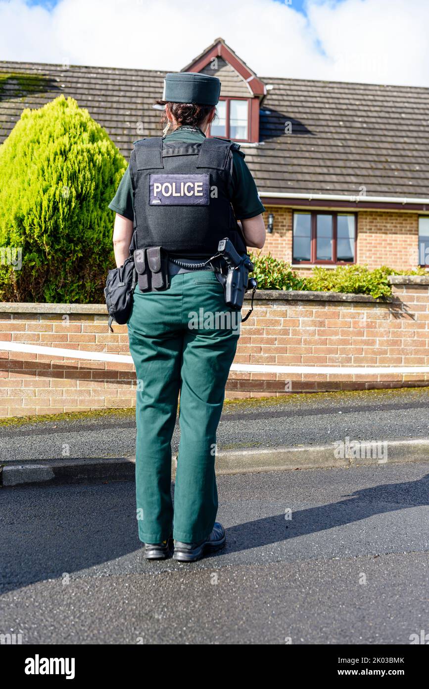 Saintfield, Northern Ireland, UK, 09/09/2022 - Police close off a property after a suspicious device was left on the front step.  It was later declared to be a hoax. Stock Photo