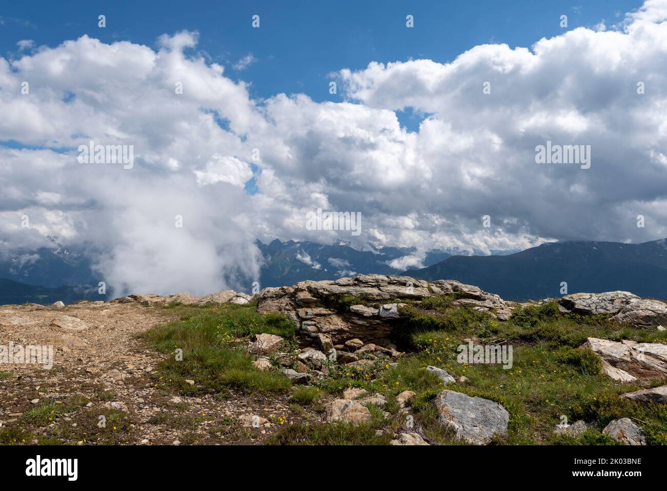 White clouds move over the Alps, European long-distance hiking trail E5, crossing the Alps, Zams, Tyrol, Austria Stock Photo