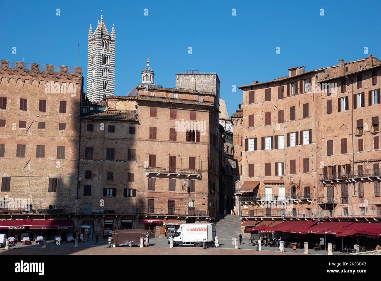 Piazza del Campo, behind it the cathedral of Siena, Tuscany, Italy Stock Photo