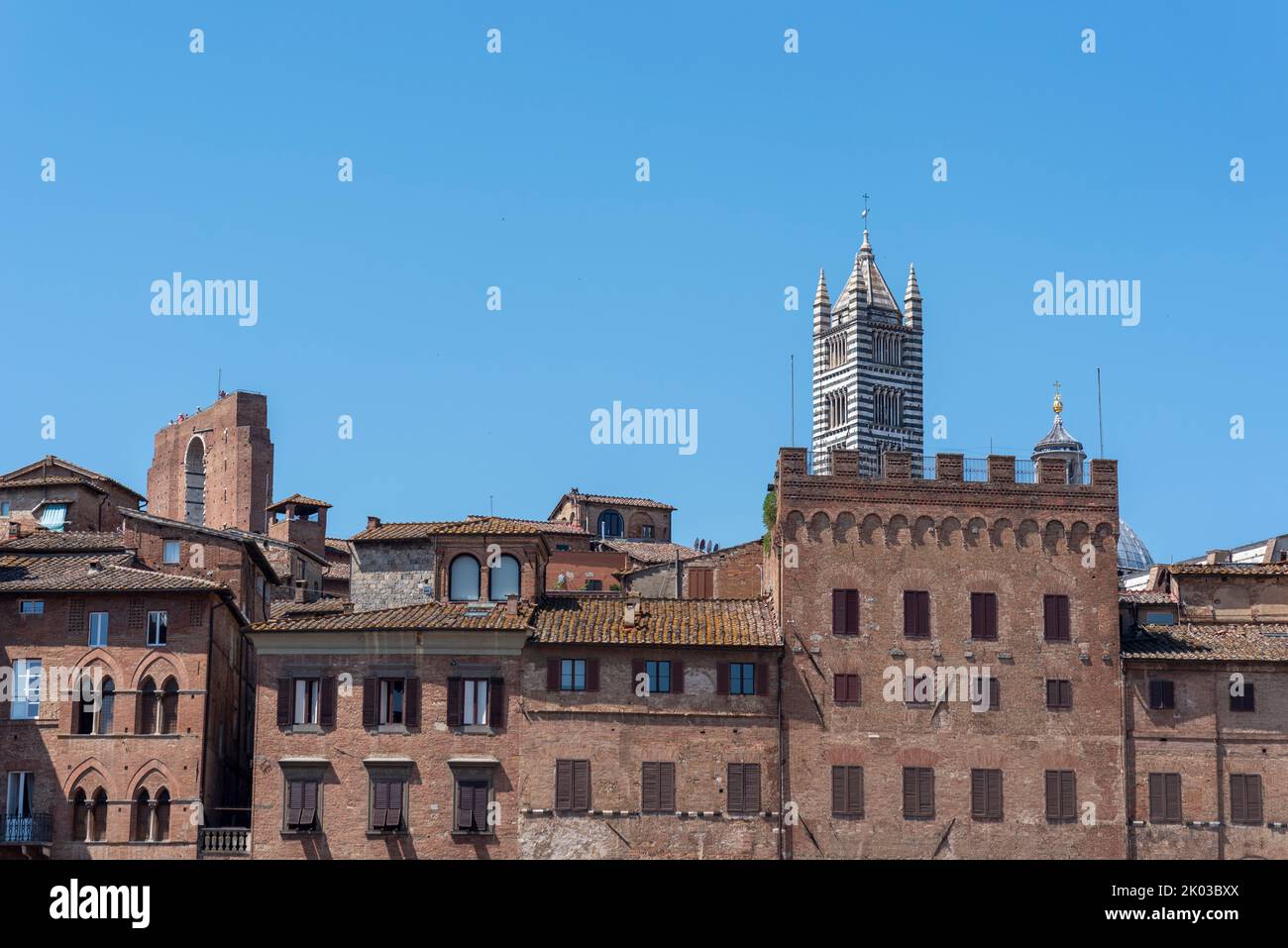 Piazza del Campo, behind it the cathedral of Siena, Tuscany, Italy Stock Photo
