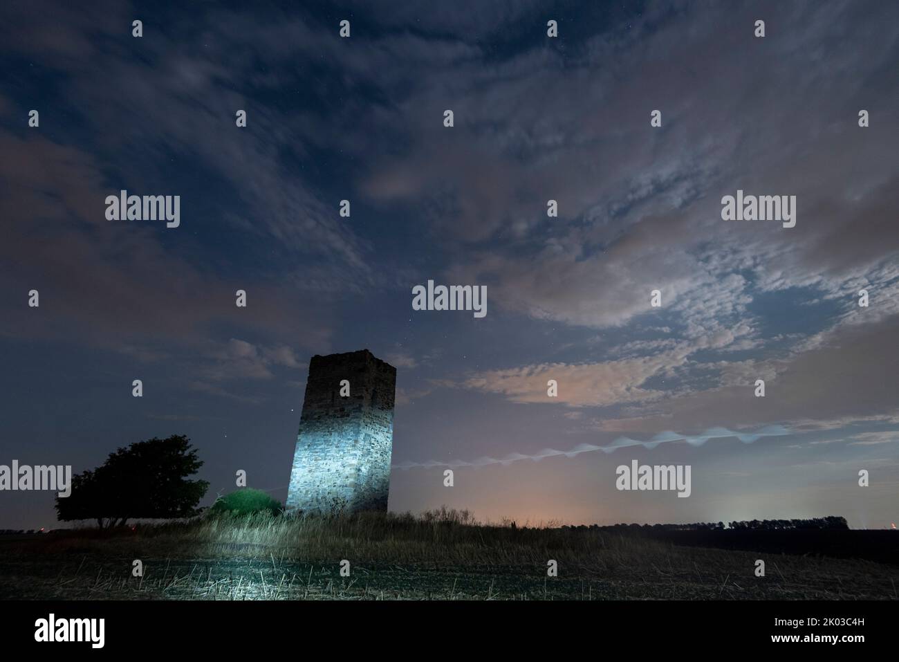 'Blaue Warte', medieval watchtower, built 1438, flight path of an owl, night sky, Wanzleben, Saxony-Anhalt, Germany Stock Photo