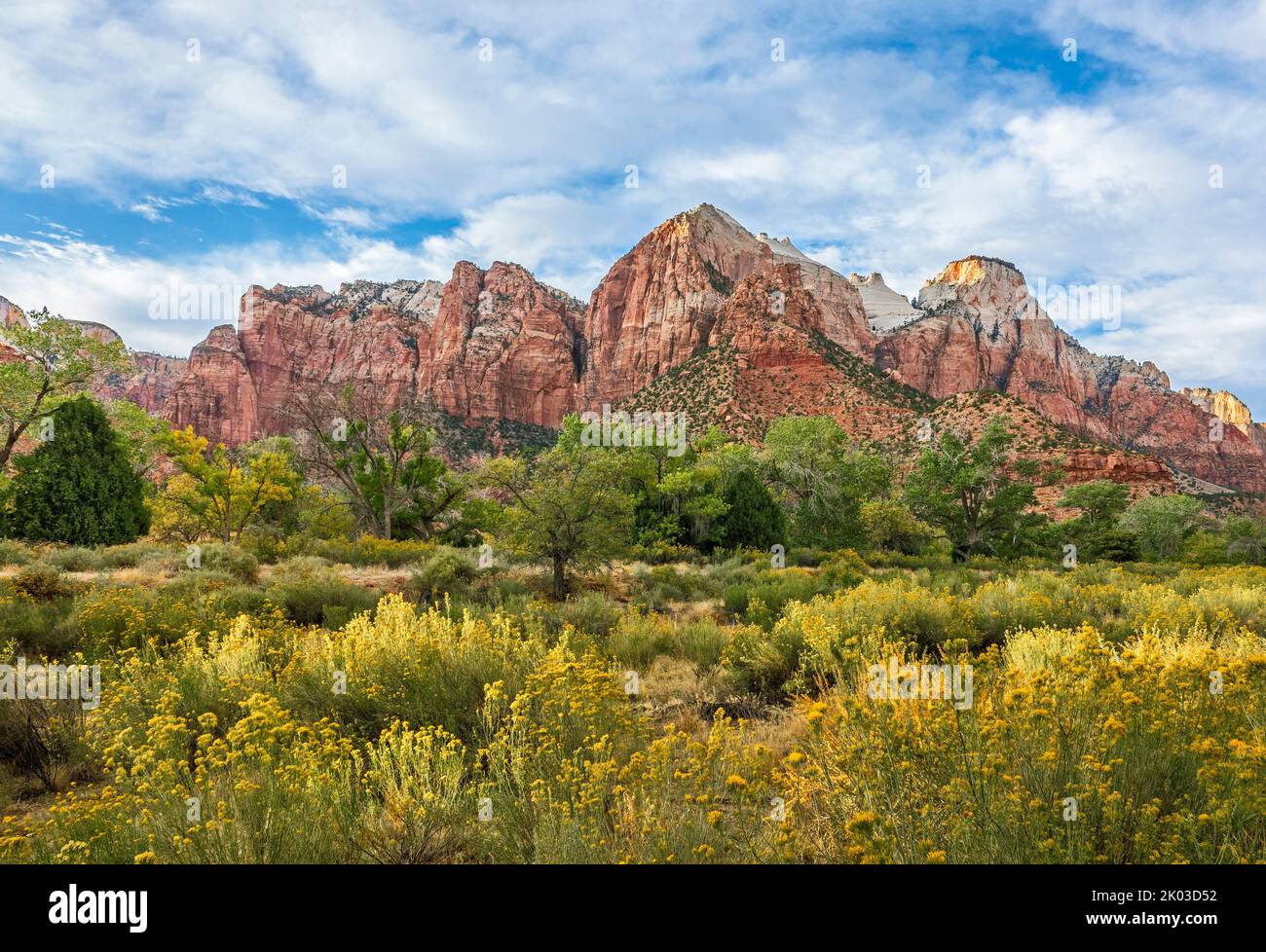 Zion National Park is located in southwestern Utah on the border with Arizona. It has an area of 579 kö² and lies between 1128 m and 2660 m altitude. Landscape at the Pa'rus Trail. Right The Sentinel Stock Photo