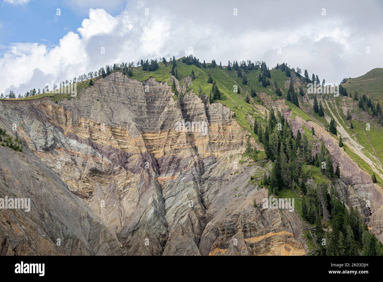 Italy, province of Belluno, Vigo di Cadore. South side of Mount Oberkofel along the Sauris / Casera Razzo road, Werfen formation created by the erosion of Rio Felempecle Stock Photo