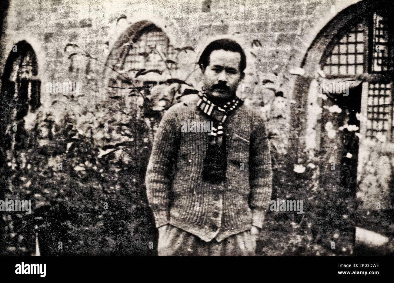 Ren Bishi at a Yan'an Cave Dwelling During Organizing Rectification Movements. Ren Bishi was a military and political leader in the early Chinese Communist Party. In the early 1930s, Stock Photo