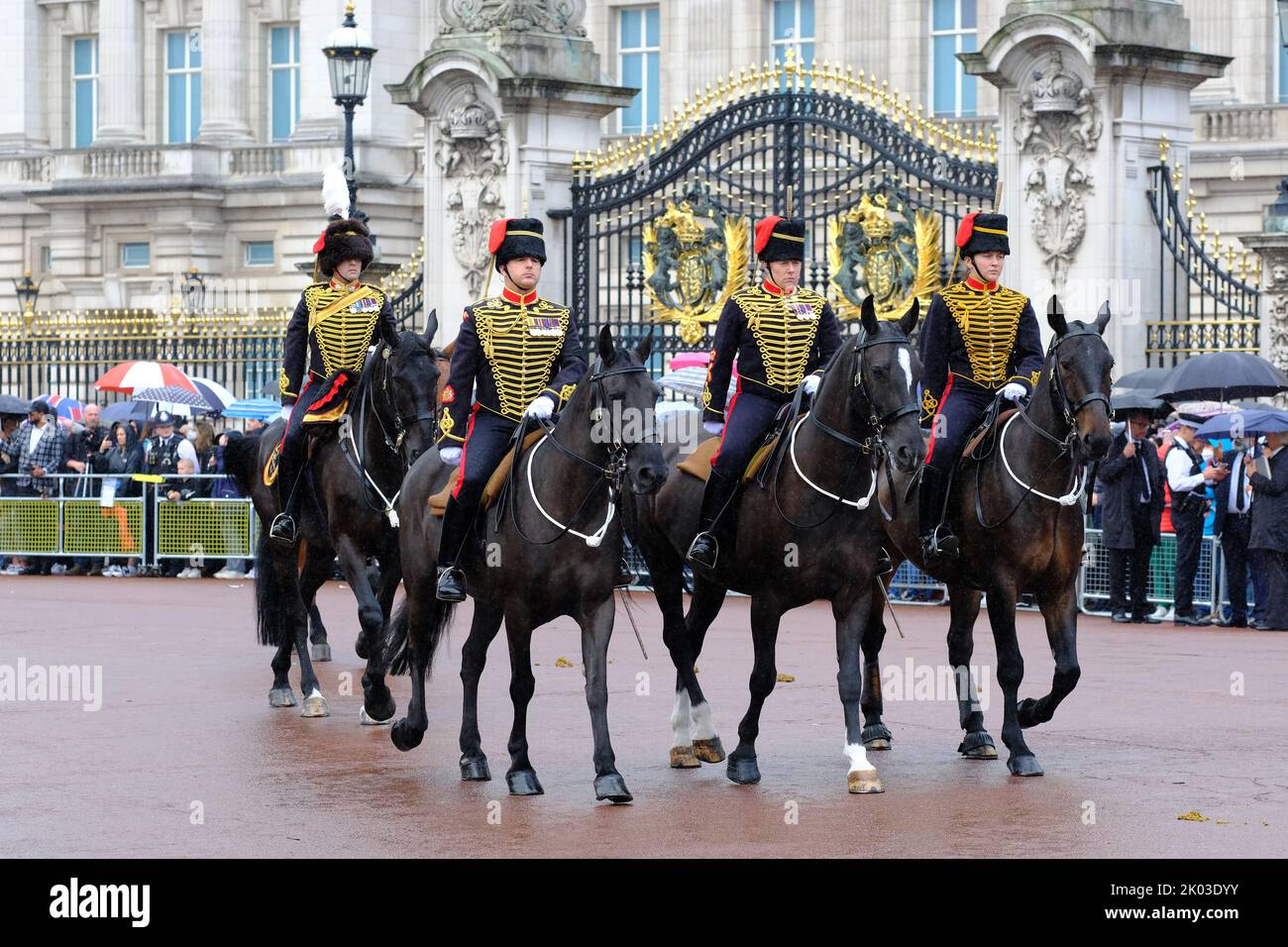 Buckingham Palace, London, UK – Friday 9th September 2022 – Members of the King's Troop Royal Horse Artillery ride past Buckingham Palace on their way for a gun salute in Hyde Park as Britain mourns the death of Queen Elizabeth II. Photo Steven May / Alamy Live News Stock Photo