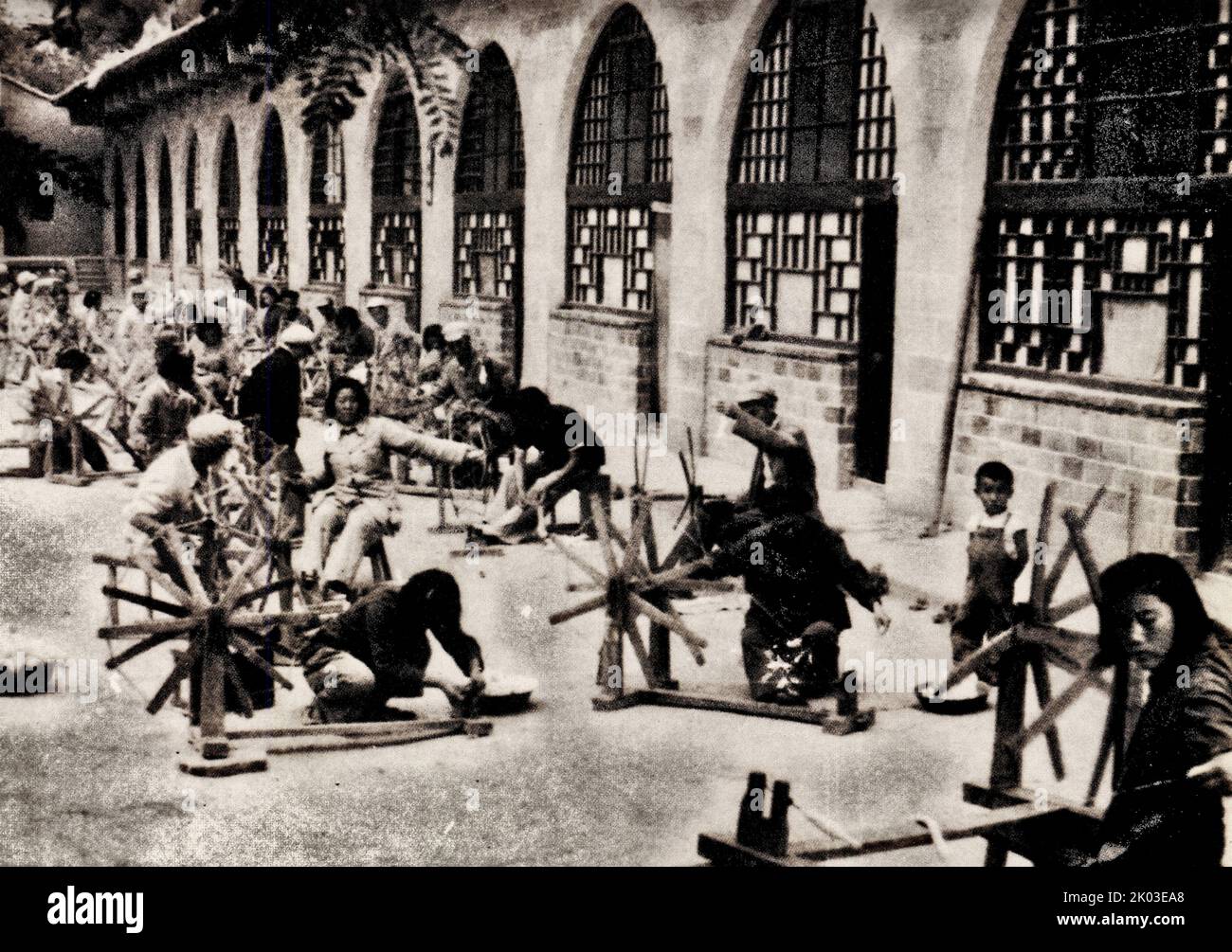 The cadres of the Party Central Committee in Yan'an actively participated in the large-scale Production Movement, and this was their spinning cotton yarn. In 1939, the Kuomintang government imposed an economic blockade on the Shaanxi-Gansu-Ningxia border area and various anti-Japanese base areas. From 1941, Stock Photo