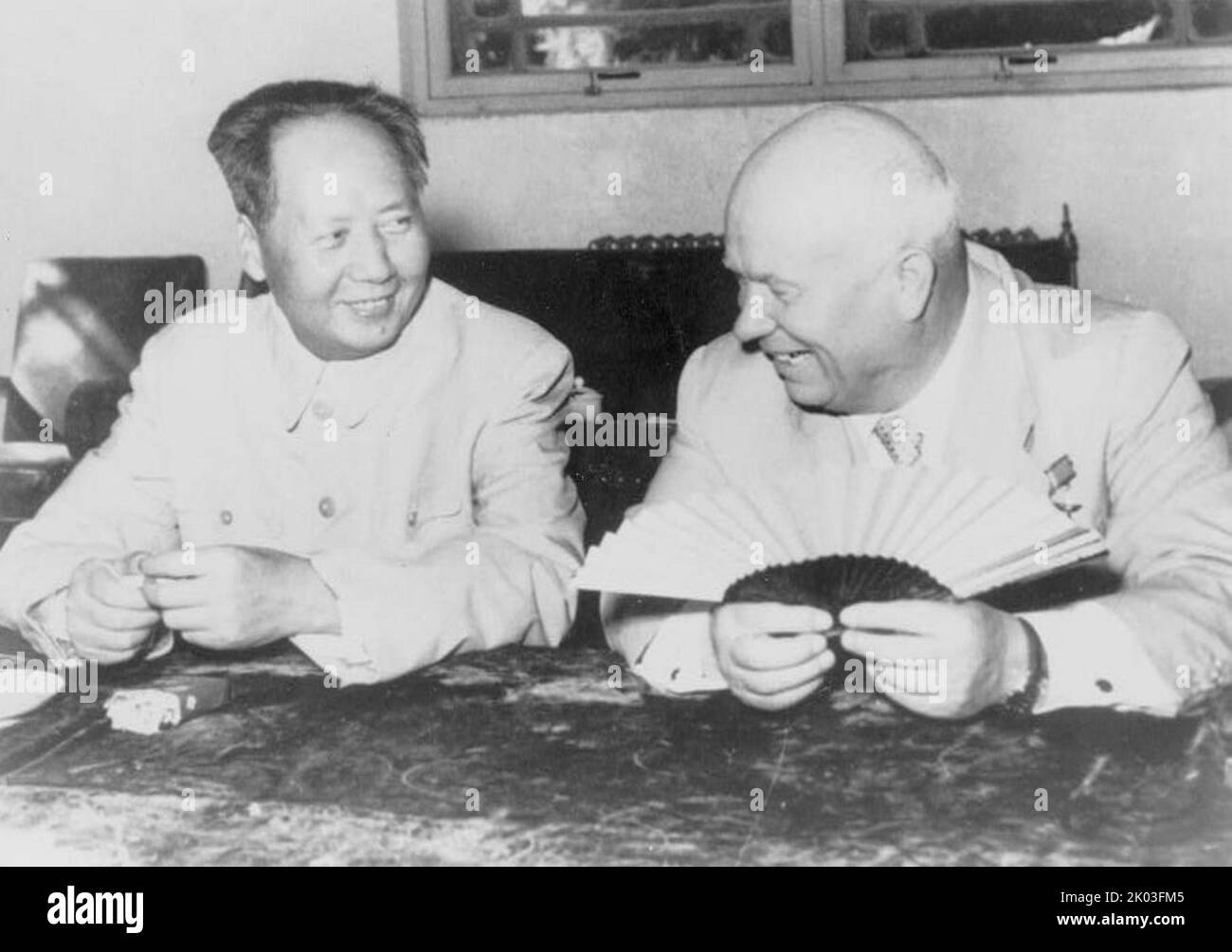 Mao Zedong, half-length portrait, seated, facing Nikita Khrushchev, during the Russian leader's visit to Beijing. Stock Photo