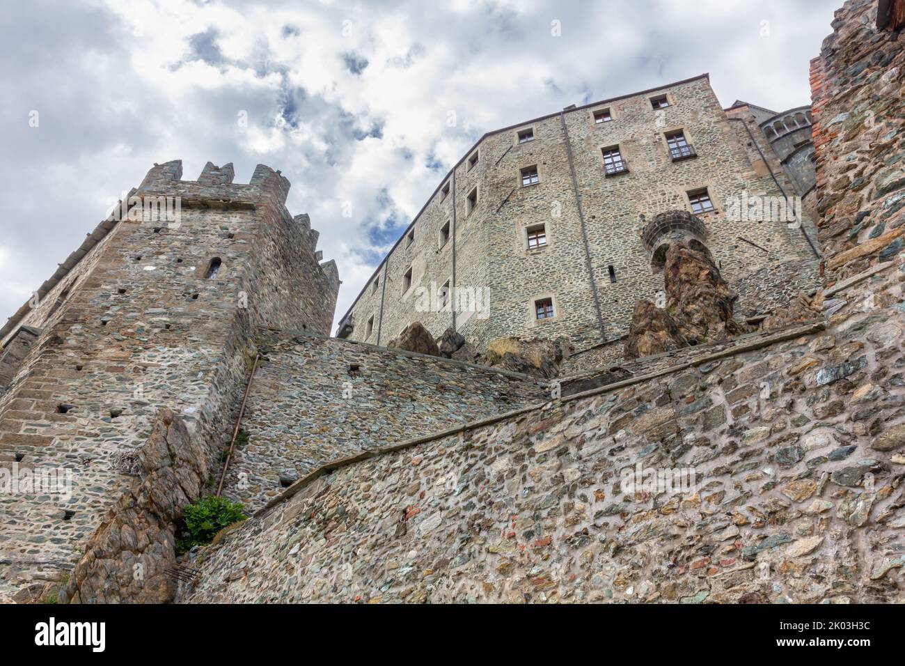 The imposing structure of the medieval Sacra di San Michele abbey in ...