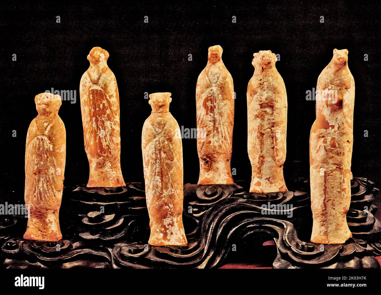 Tang Dynasty figurines of the twelve zodiac animals, each of which is an animal-headed person, wears a long robe, the trousers are long to the ground, the empty stomach, the hands are up to the chest, and the soil is red, and the whole body is covered with white powder, and many have fallen off. The animals are: rat, cow, tiger, rabbit, dragon, god, horse, sheep, monkey, chicken, dog, and pig. Stock Photo