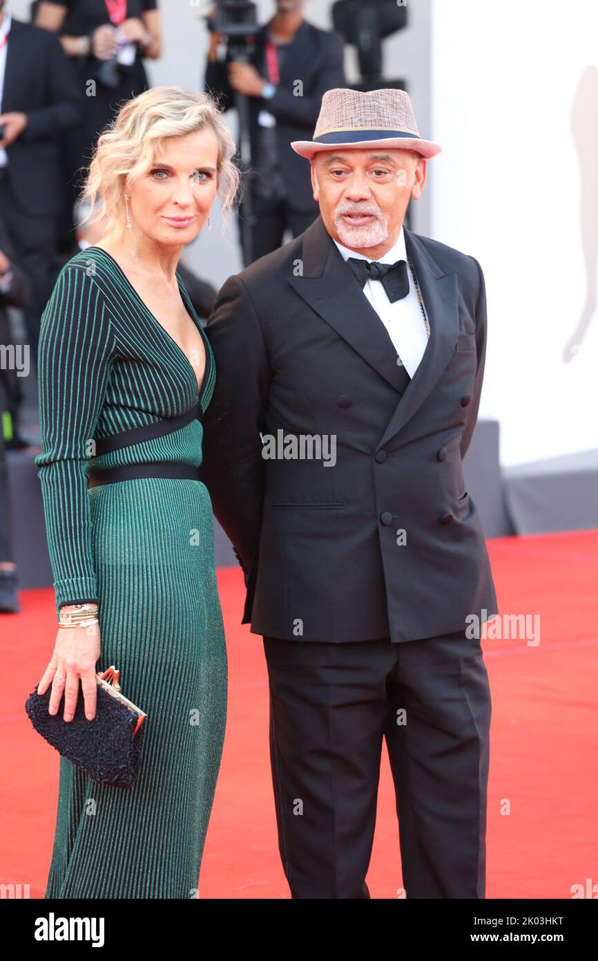 Venice, Italy, 31st August, 2022, Christian Louboutin and Melita Toscan du Plantier at the Opening Ceremony and White Noise Gala screening red carpet at the 79th Venice Film Festival in Italy. Doreen Kennedy / Alamy Live News Stock Photo