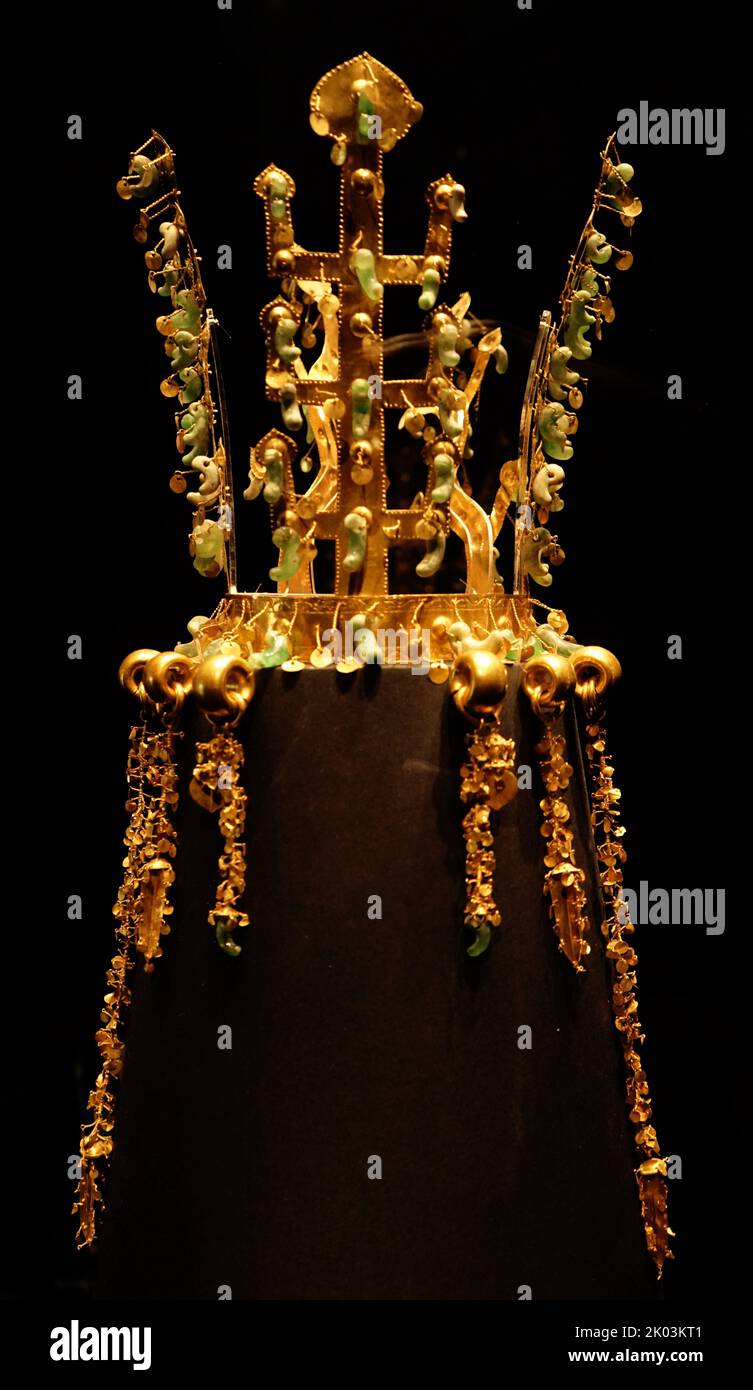 The Gold crown of Silla from Hwangnamdaechong in the National Museum of Korea. It is a National Treasure of Korea. The height of the crown is 27.5 centimetres and the gold chains and pendants that dangle from the crown, known as Suhasik. This crown may have been made for a queen and there is a significant controversy about who was buried in the tomb. second half of 5th century. Excavated from the north mound of Hwangnam Daechong Stock Photo