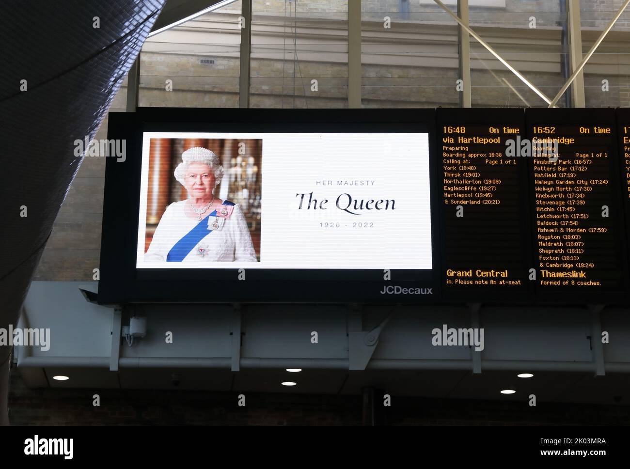 London, UK. 9th September 2022. Following her sad death, tributes to Queen Elizabeth II appeared all over London. Here, photos of her are shown at Kings Cross station, north London. Credit:/Monica Wells/Alamy Live News Stock Photo