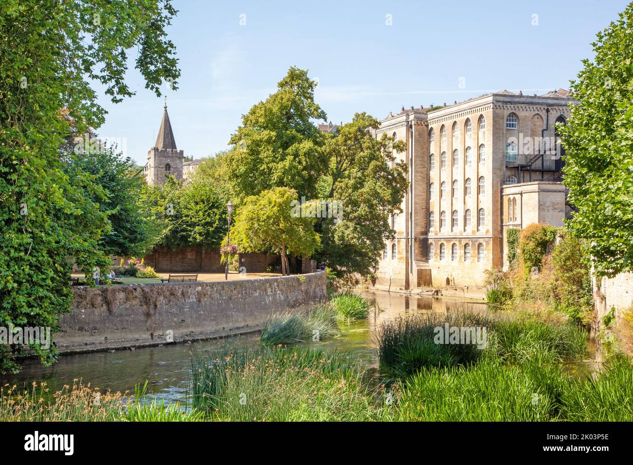 The old Abbey mill on the banks of the river Avon as it flows through the Wiltshire market town of Bradford on Avon Stock Photo