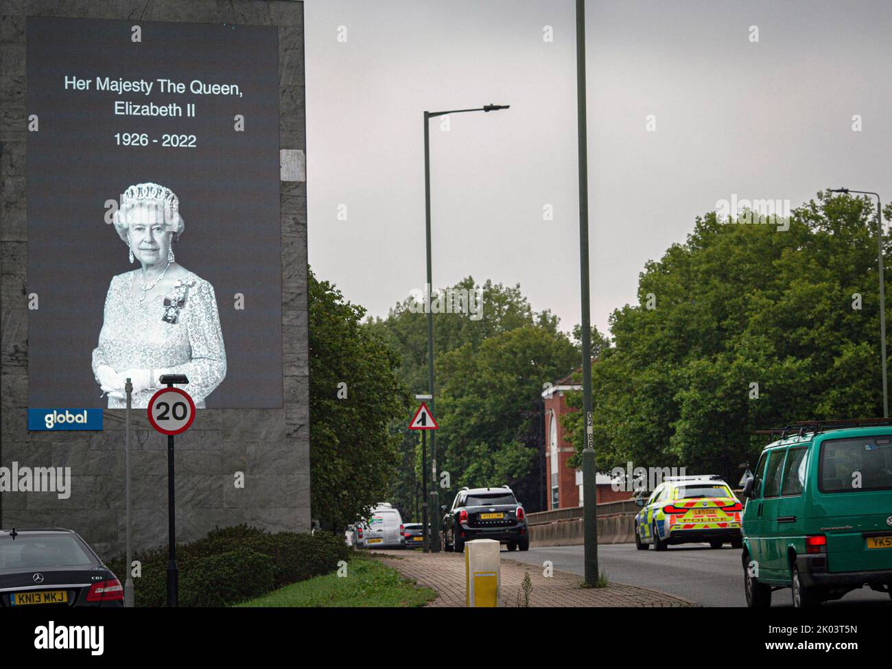 London UK. 9 September 2022. A portrait of Her Majesty Queen Elizabeth II is displayed at A3 London Road in tribute as the nation begins a 10 day period of mourning. Queen Elizabeth died on Wednesday 8 September who the longest serving British monarch and will be succeeded by her son .Photo: Horst A. Friedrichs Alamy Live News Stock Photo