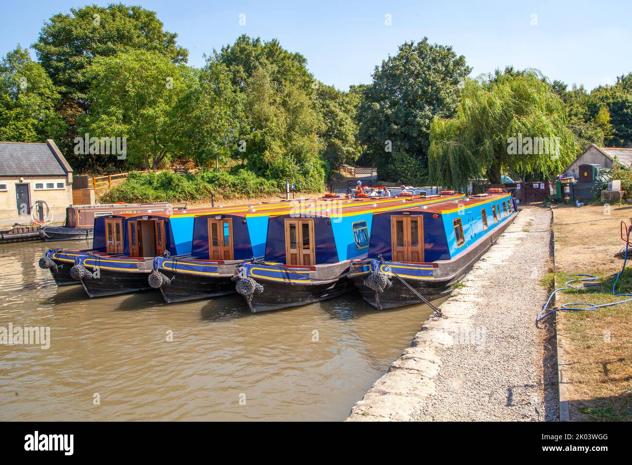 Boats in Bradford locks on the Kennet and Avon canal at Bradford on Avon Wiltshire Stock Photo