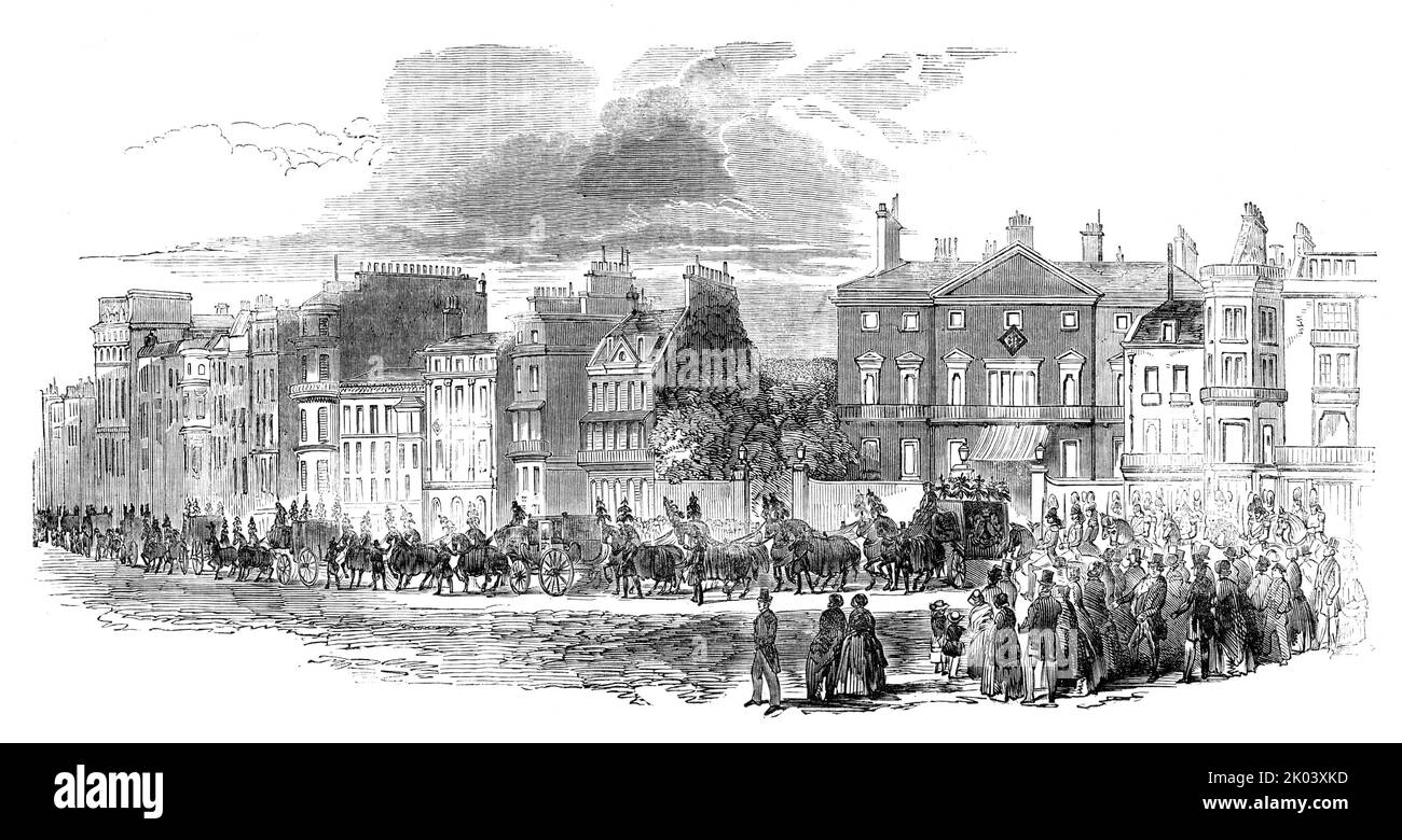 The Funeral Procession leaving Cambridge House, Piccadilly, [London], 1850. Death of Prince Adolphus, Duke of Cambridge. '...some few hundred persons had assembled on the brow of the hill opposite Cambridge House...Shortly after five o'clock, the 1st and 2nd battalions of the Coldstream Guards (the late Duke's regiment) marched through Piccadilly, en route from St. George's Barracks to Kew, where it had been arranged they should form a guard of honour to receive the Royal remains upon their arrival. One hundred men of the regiment filed off at Cambridge House...and formed in the courtyard in f Stock Photo