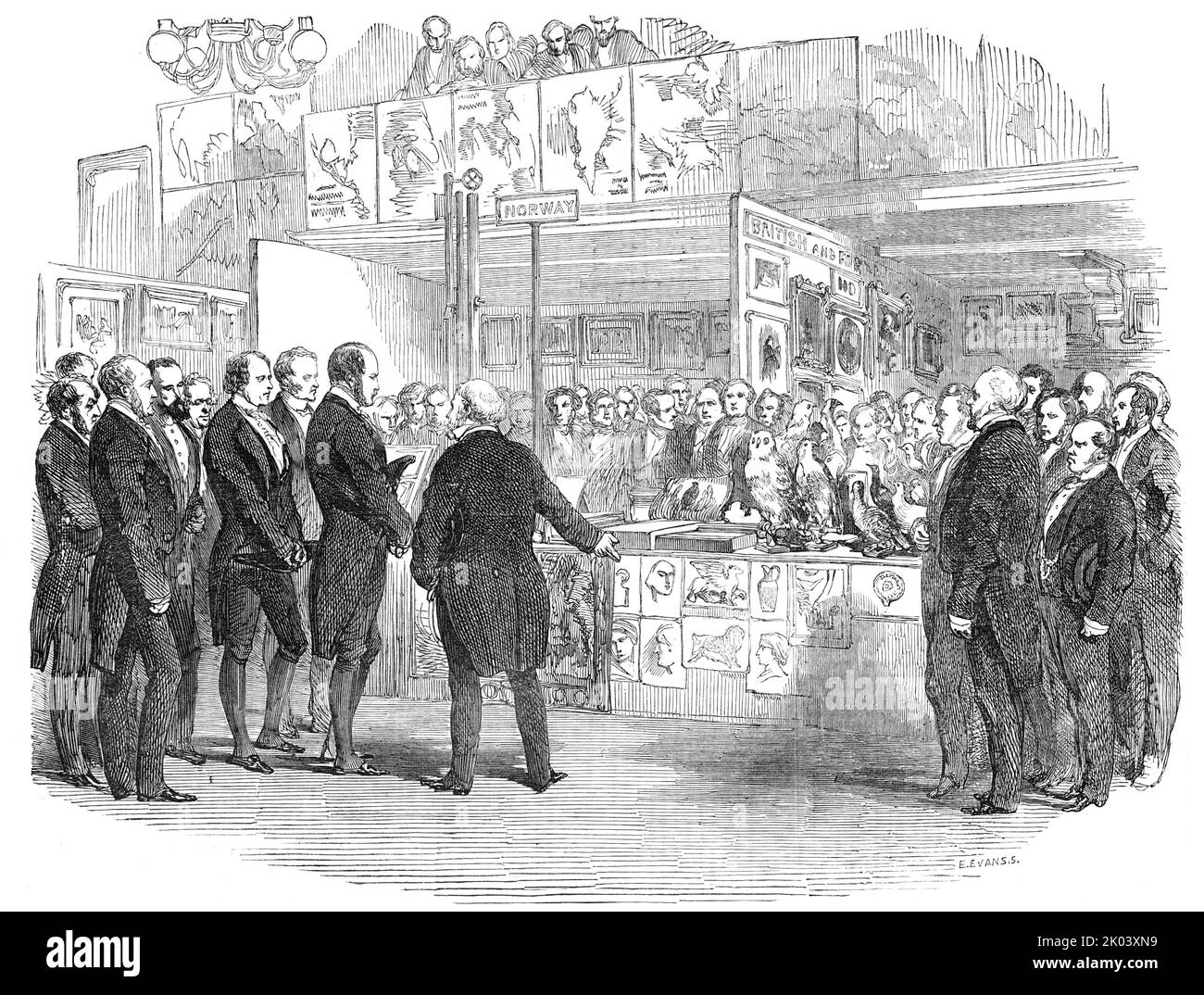 Conversazione of the Educational Exhibition, in St. Martin's-Hall, 1854. Prince Albert visits a display in London: 'The most careless person can there see at a glance the various merits of different systems of education, and can thus discover, without any trouble, what no amount of reading would have served to teach him, that, in many respects, we are greatly behind other nations in the various means and appliances employed in carrying on the great work of elementary education...in the middle are four tables, on which are exhibited the articles from abroad; and the galleries are devoted to phi Stock Photo