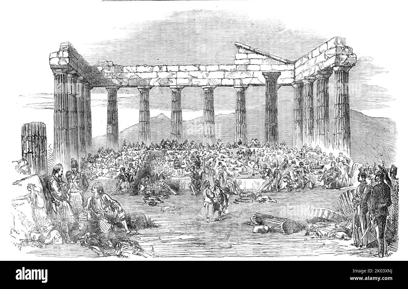 Fete to Officers of the English and French Forces, and the Greek Army and Navy, in the Acropolis at Athens, 1854. Scene during the Crimean War: a banquet for officers of the '...Army of Occupation, as well as to those of the men-of-war of the two Powers and of the Austrian vessels...The banquet was given in the interior of the Temple of Minerva, in the Acropolis, and thus borrowed from the locality a grandeur which forcibly struck all the foreigners present..The Fete was attended by General Magnan, and the officers (military and naval) of the French expeditionary force; Colonel Lockyer, K.H., Stock Photo