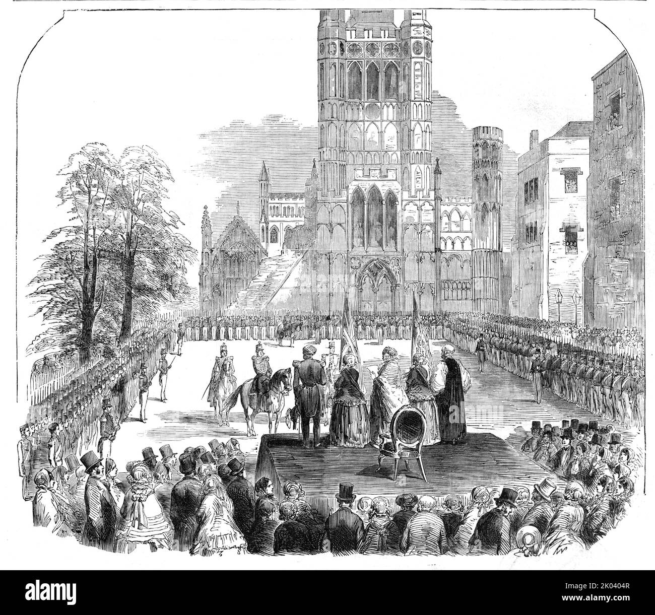 Presentation of Colours to the Cambridgeshire Militia, at Ely, 1854. A platform was erected, covered with crimson cloth, on Palace Green just opposite the Cathedral, from where the Countess of Hardwicke presented the Colours to the Cambridgeshire Militia, previous to their leaving for Ireland. '...the Countess rose from her seat and, advancing towards the edge, supported by the Earl on one side and her daughters on the other, read an eloquent address: 'I present you with these Colours - I call upon you to follow them - for doubtless, in the hands of such officers, they will lead you to the pat Stock Photo