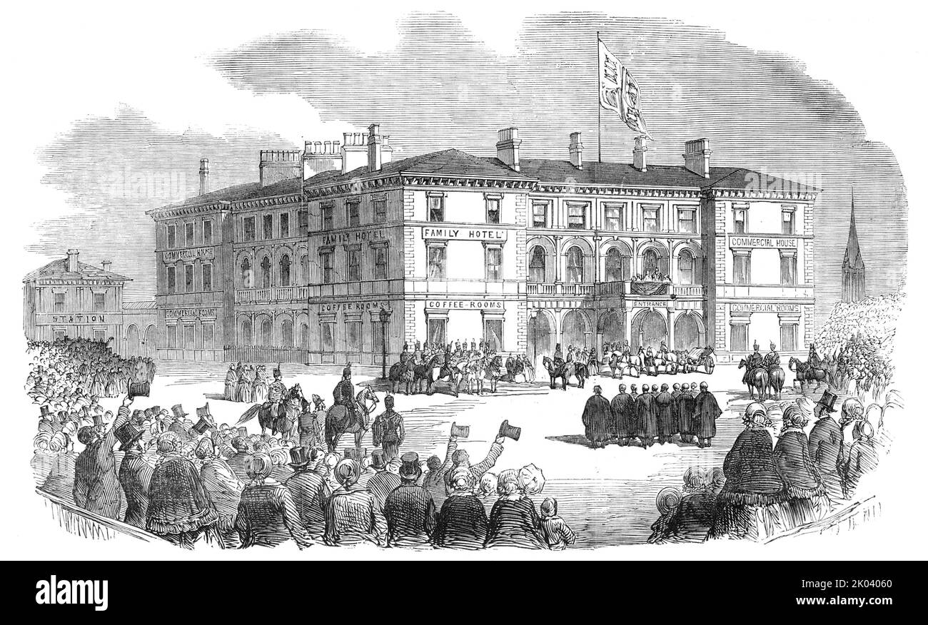The Queen at the Station Hotel, at Hull, 1854. Queen Victoria visits Yorkshire by train. 'Amid the firing of artillery and shouts of welcome, which were taken up and repeated by ten thousand hearty Yorkshire voices in and around the station, her Majesty stepped upon the platform...Preceded by the Mayor and Sheriff, and leaning upon the arm of the Prince Consort, her Majesty advanced towards the apartments prepared for the Royal visitors in the Station Hotel, the entrance to which opens directly upon the platform...The railway station was brilliantly lit up, so that none of the details of the p Stock Photo