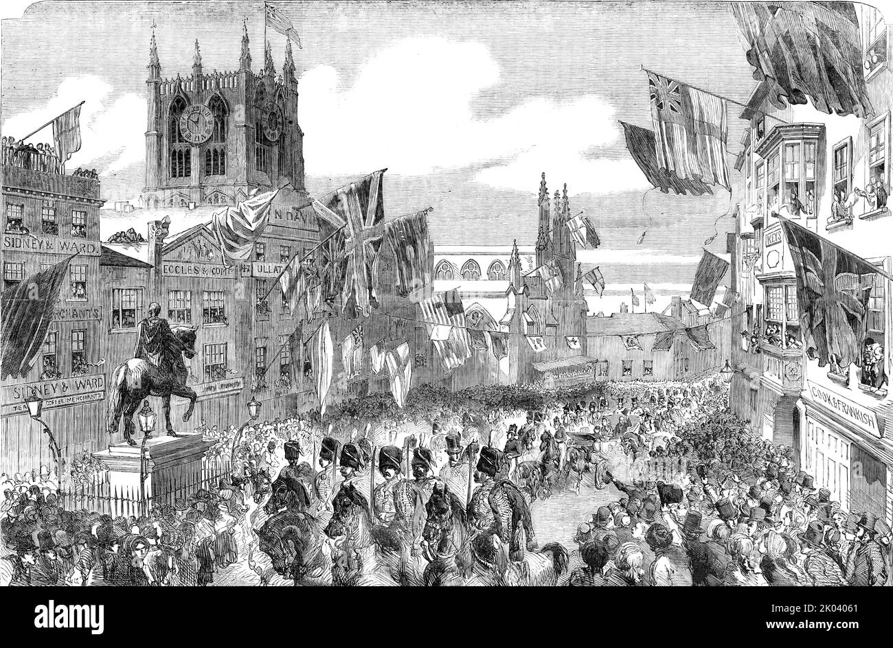 Her Majesty's Visit to Hull - the Procession in the Market-Place, 1854. Queen Victoria visits Yorkshire. 'The inhabitants testified their loyal devotion by an illumination so general, that, along whole lines of streets, scarcely a house could be seen which had not a device of some kind or other. The chief display was in the Market-place and in Whitefriargate, where triumphal arches blazed with light, and the Wilberforce monument and the gilded statue of King William III. were thrown into bold relief. A very pretty effect was produced by lighting up from the interior the stained-glass window of Stock Photo