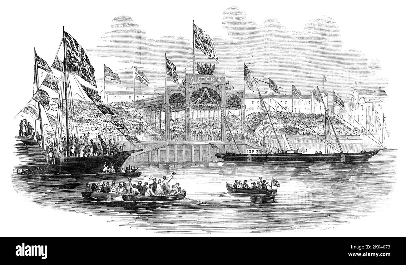 Embarkation of Her Majesty, at Hull, 1854. Queen Victoria leaves Hull in Yorkshire. 'The pier...was covered with a substantial roof...and beneath this more seats were erected for the accommodation of spectators...Several bouquets were cast at the feet of the Queen, perhaps not exactly in accordance with strict ideas of courtly propriety...Again the cannon thundered, and again military bands vied with each other in their performance of the National Anthem. Her Majesty descended the carpeted slope which led down from the pier, and was handed on board her yacht by the Prince Consort. The guns of Stock Photo
