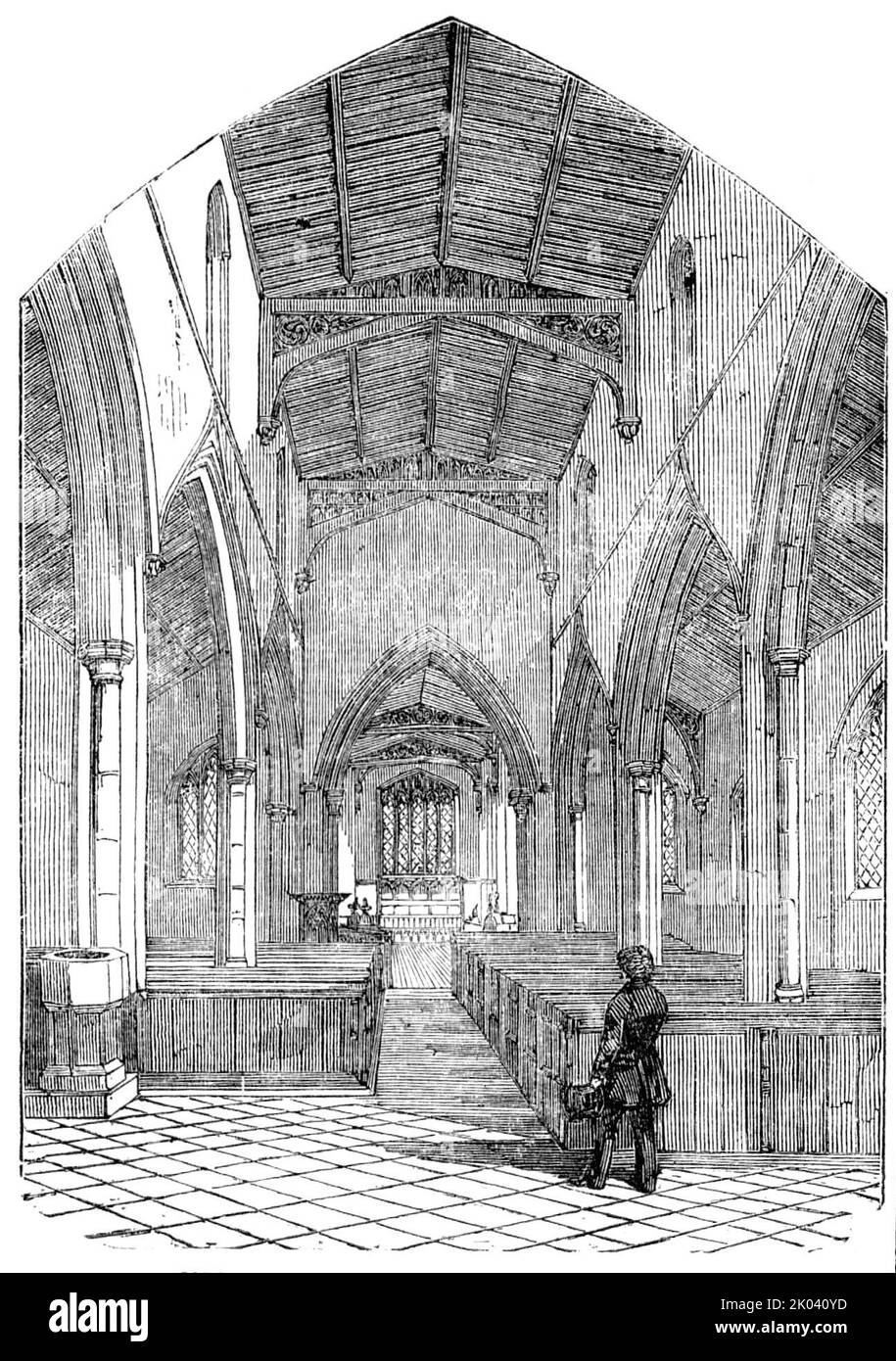 Restoration of St. Nicholas Church, Islip, Northamptonshire, 1854. 'The Church has been reseated with...oak. The stone work to the arcades and windows has been repaired, and the walls re-plastered. The tower arch has been thrown open...and a new belfry floor constructed. A new carved oak pulpit has also been set up...At the back of the altar is a reredos, of Caen stone...underneath are Minton's ornamental tiles. The brass standards for lighting the Church and the lectern are by Messrs. Hardman, of Birmingham. A stained glass window has been placed in the tower...designed from old fragments fou Stock Photo