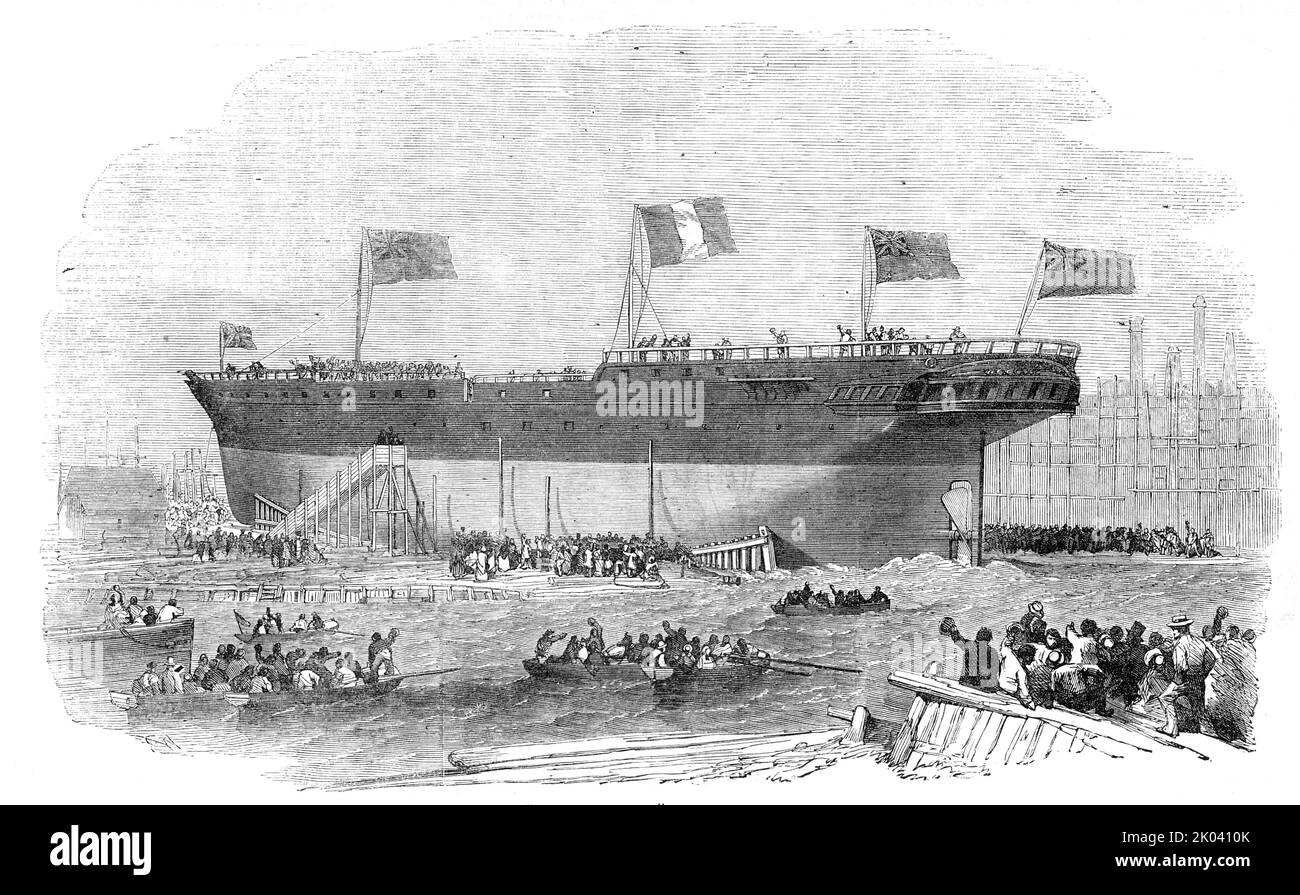Launch of the &quot;Vittorio Emanuele&quot; Iron Screw Steamer, at Blackwall, 1854. Steamship on the Thames in London. 'The Vittorio Emanuele has been constructed under the superintendence of Messrs Draper, Pietroni, and Co. of London...[and was launched] ...from the shipyard of Messrs. Mare and Co., of Blackwall...[She was] an iron screw-steamer of 1500 tons burthen, and 280-horse power (the engines making by G. Rennie and Co), with accommodation for 250 passengers, 800 tons of merchandise, and 500 tons of coals...This boat forms the first of a fleet of steamers, to be constructed for the Tra Stock Photo