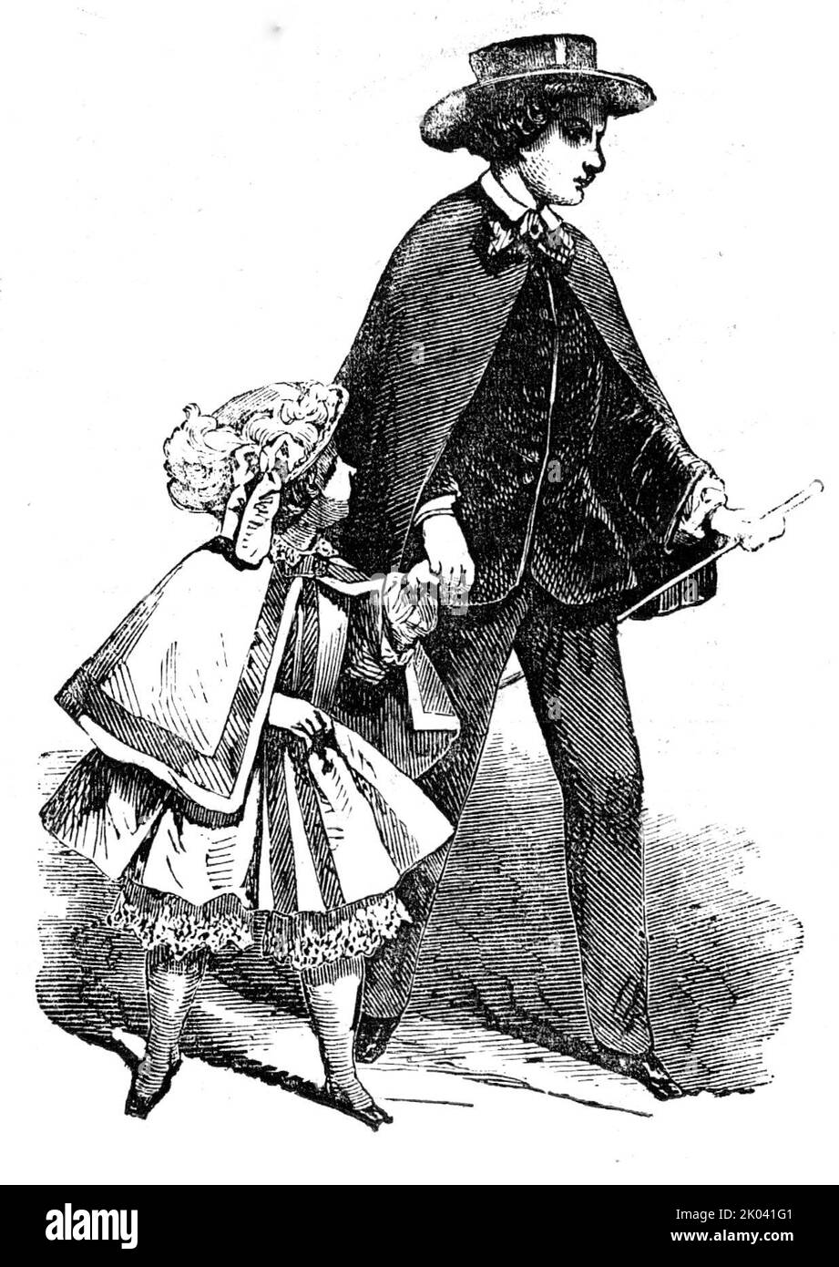 Paris Fashions for the New Year, 1854. 'Boy's Dress. Sailor's cap, bound with oil-cloth; brown cloth cloak; jacket of black velvet, with rather wide sleeves; black trousers, and patent leather boots. Cap of blue velours &#xe9;pingl&#xe9;, with a white feather, and a knot of velvet ribbons of a similar shade'. From &quot;Illustrated London News&quot;, 1854. Stock Photo