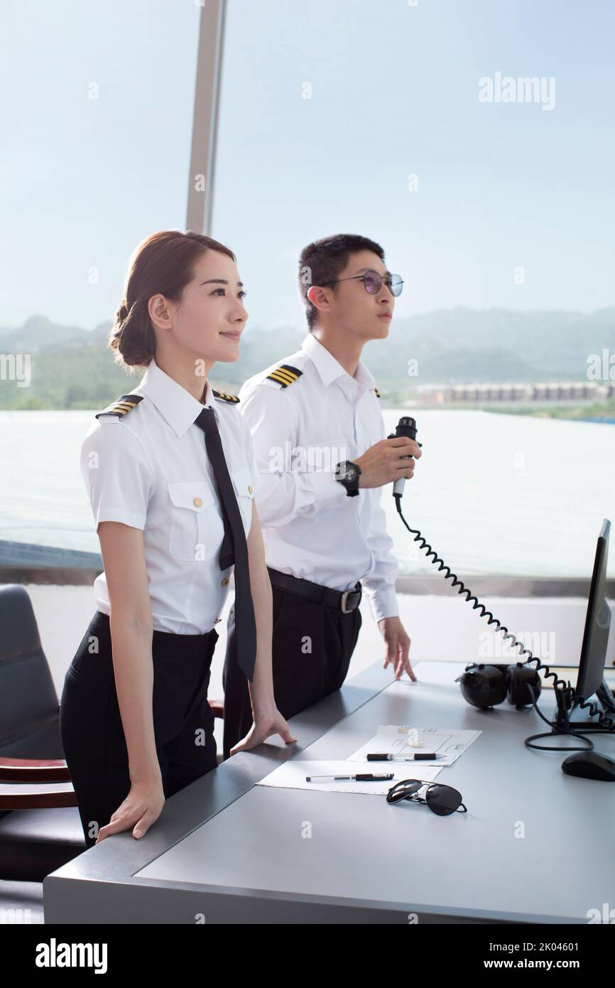 Chinese air traffic controllers in tower Stock Photo